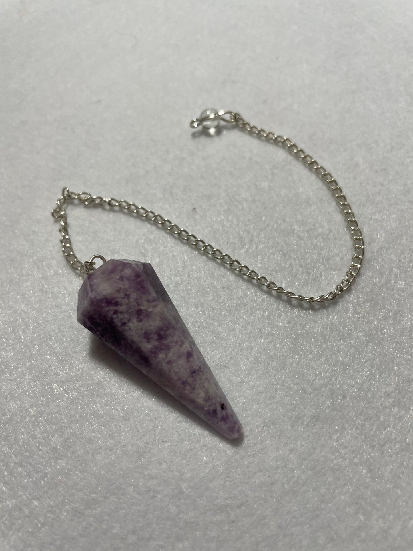 Pretty purple Lepidolite Pendulum is 1.65” and with chain is 9”