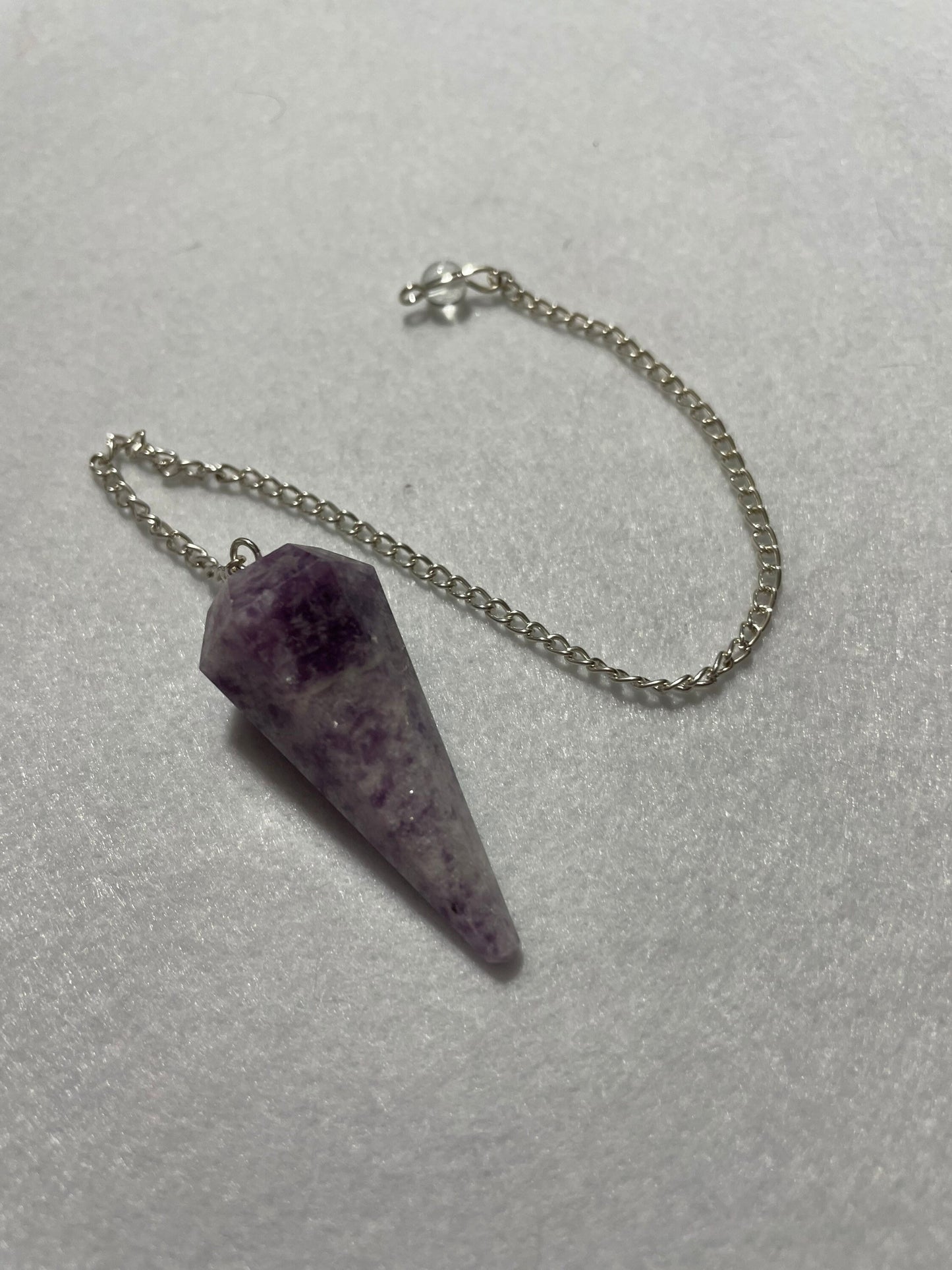 Pretty purple Lepidolite Pendulum is 1.65” and with chain is 9”
