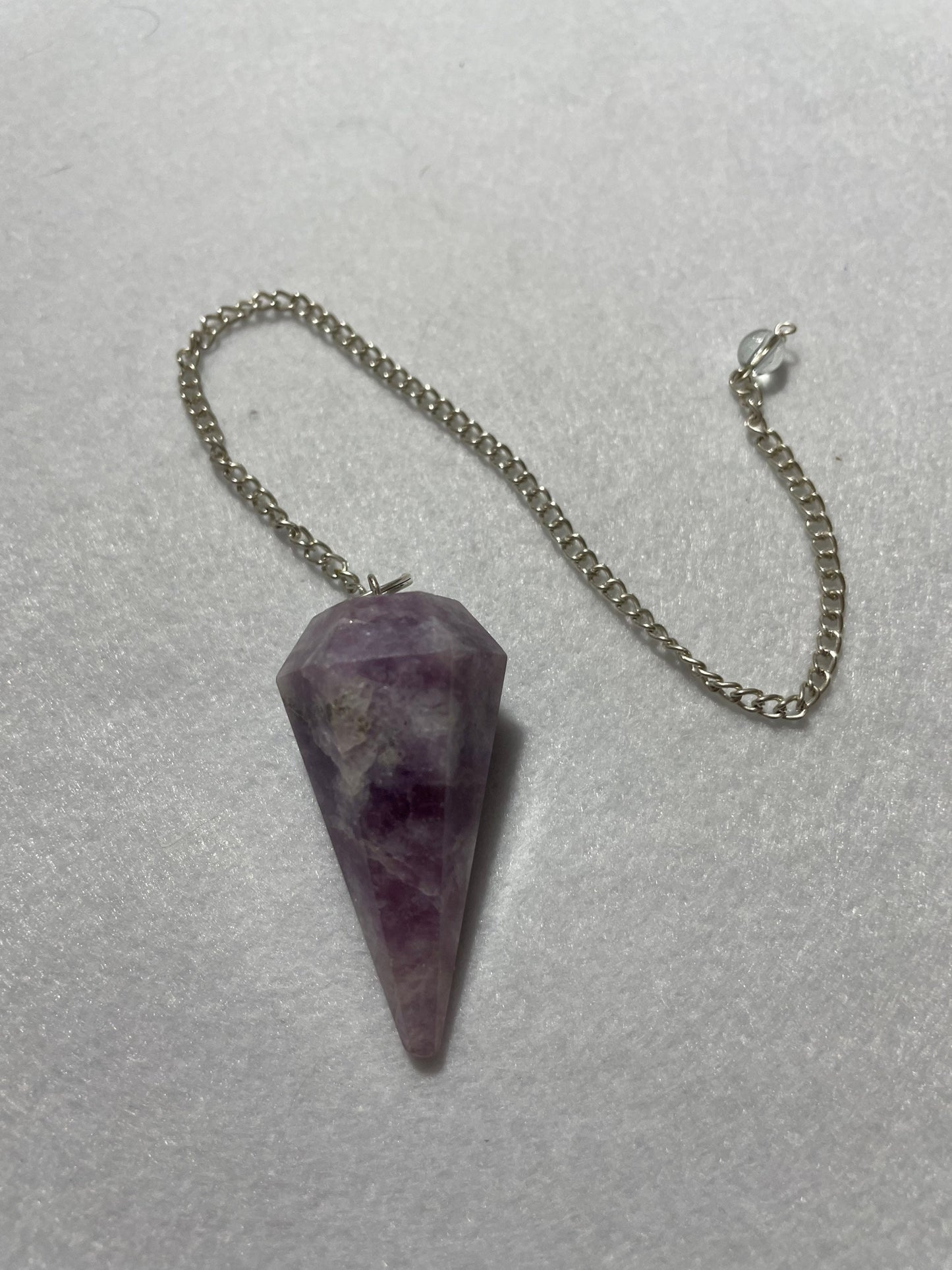 Gorgeous Lepidolite Pendulum is 1.75” and with chain is 9.25”