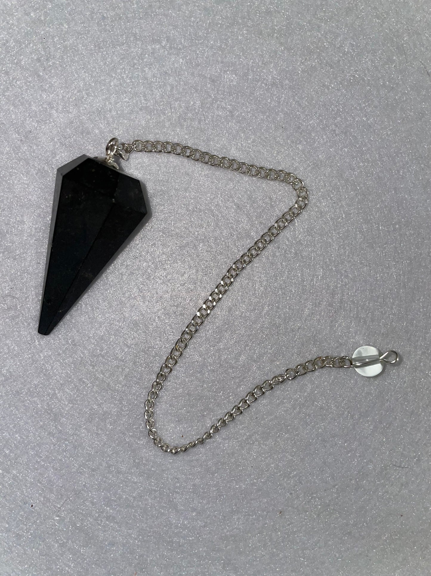 Black Obsidian Pendulum is 1.65” and with chain is 8.5”