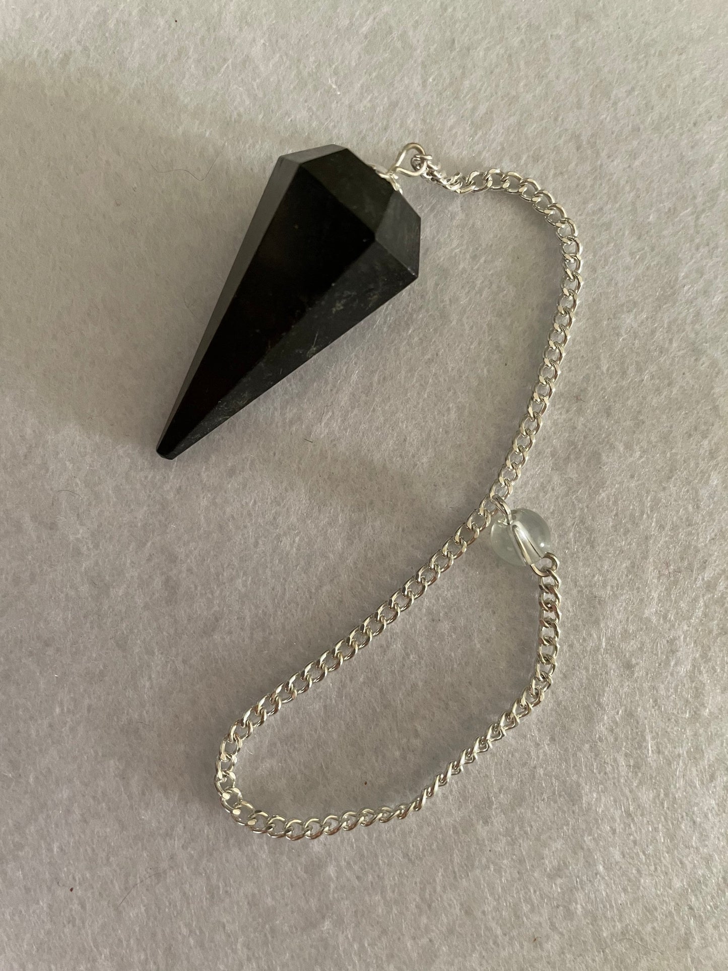 Black Obsidian Pendulum is 1.65” and with chain is 8.5”