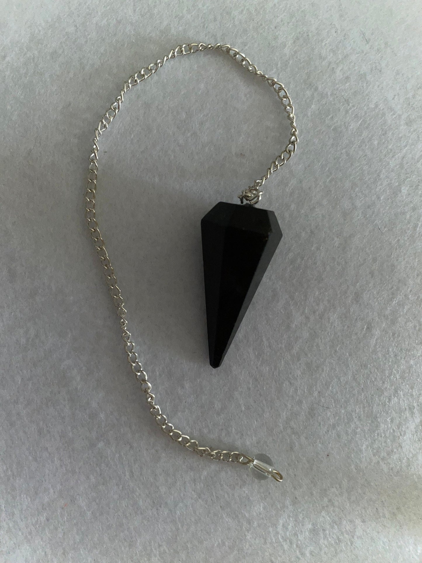 Awesome Black Obsidian Pendulum is 1.5” and with chain is 9”.25”