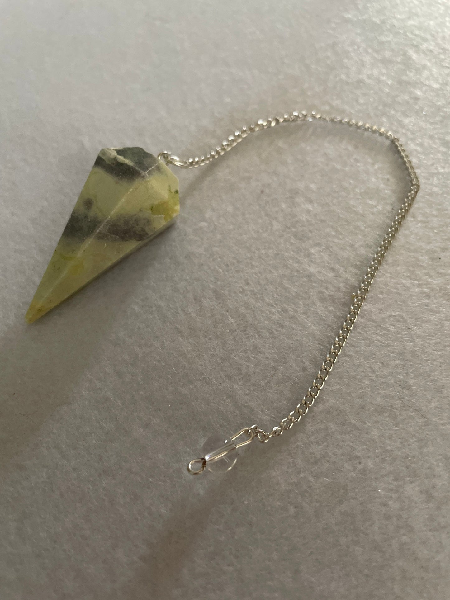 Beautiful Serpentine Pendulum is 1.85” and with chain is 8.5”