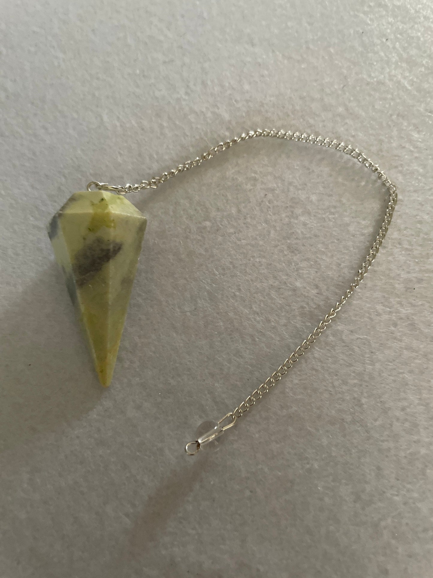 Beautiful Serpentine Pendulum is 1.85” and with chain is 8.5”
