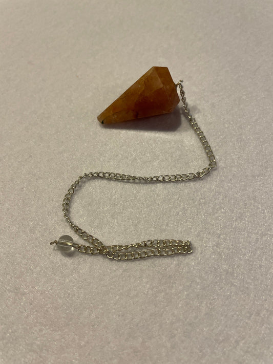 Beautiful Carnelian Pendulum is 1.25” and with the chain it is approximately 9.5”