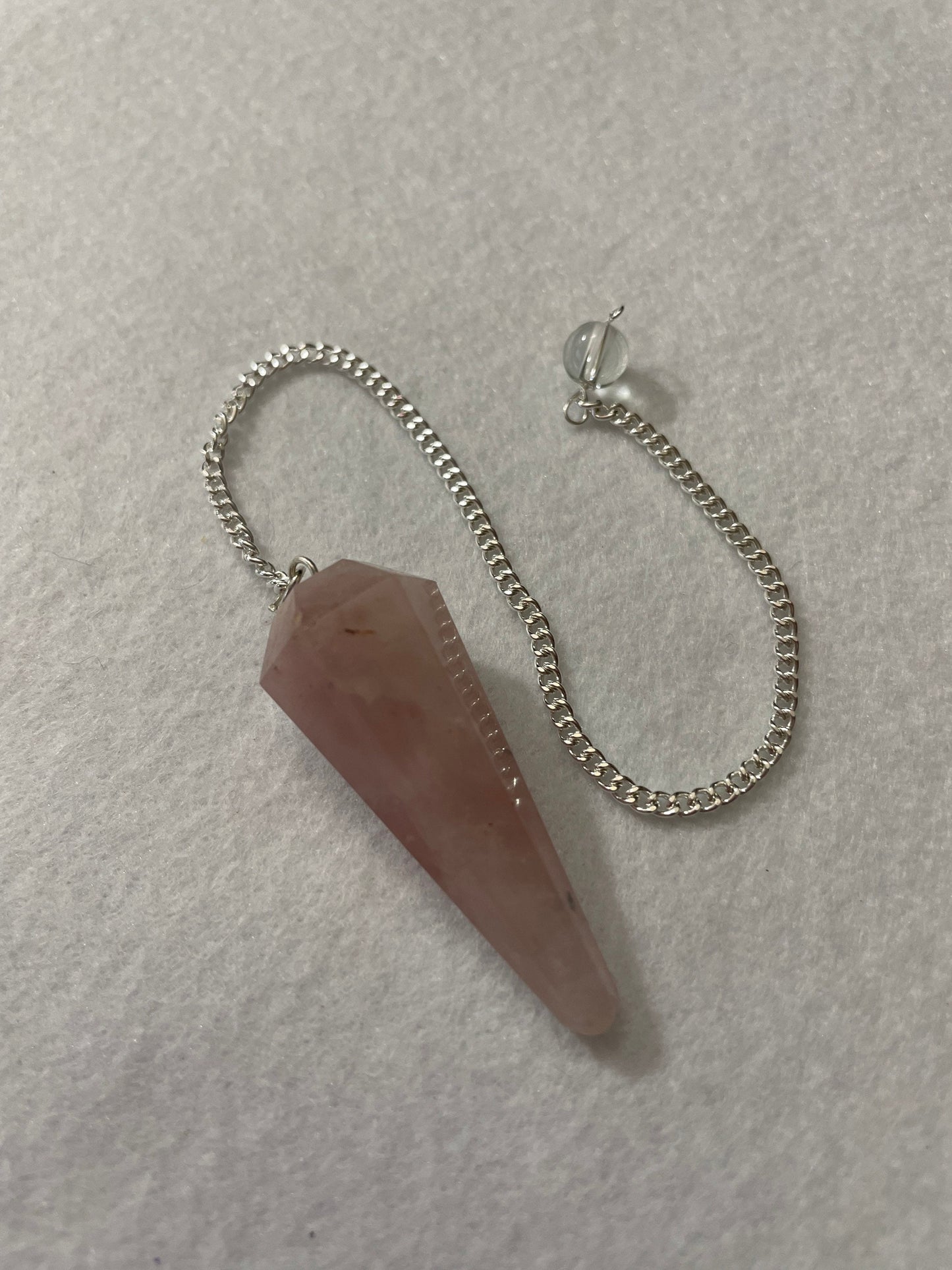 This beautiful Rose Quartz Pendulum is 1.65” and with chain is 8.5”