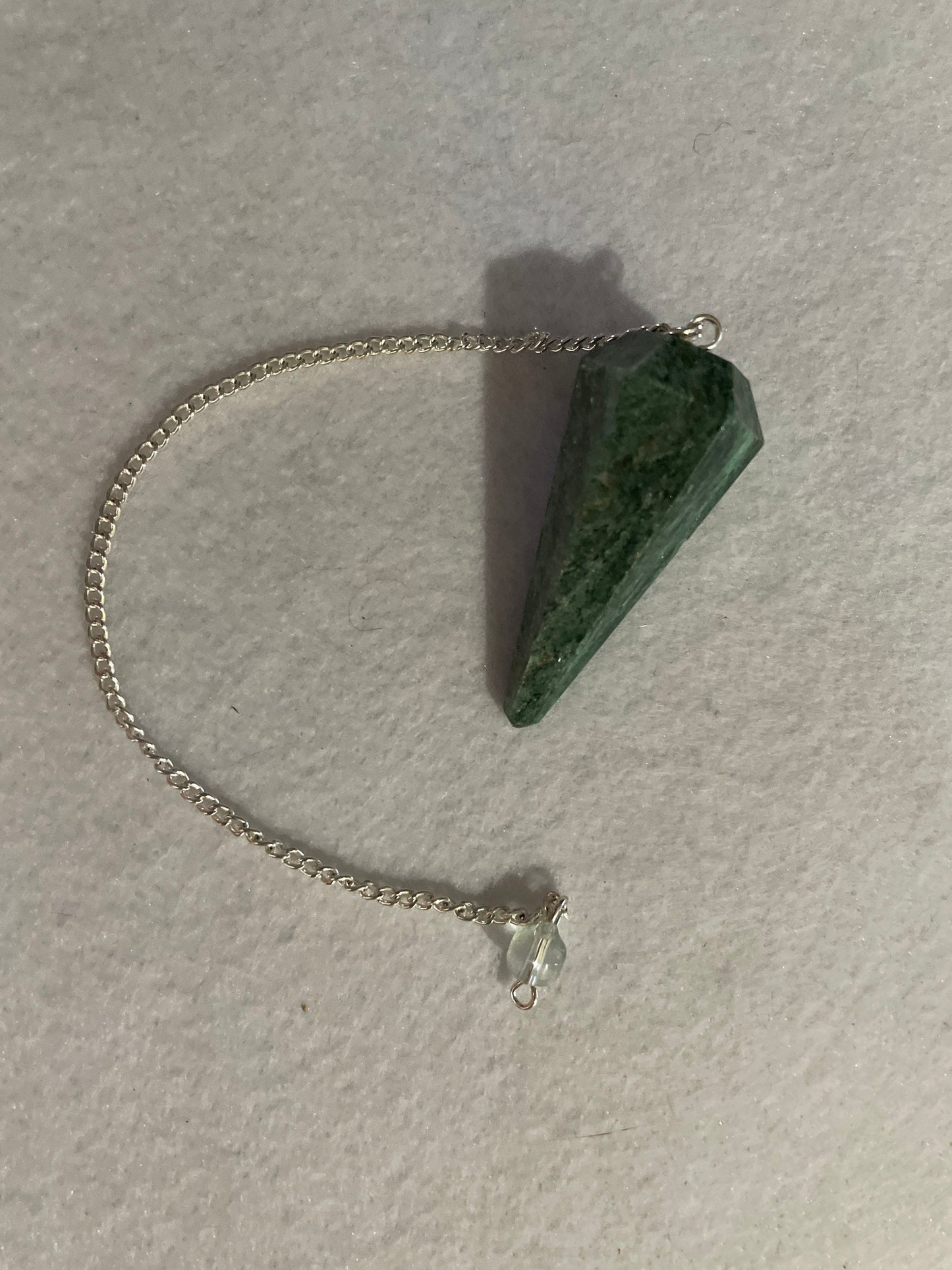 Pretty Jade Pendulum is 1.75” and with chain is 8.5”