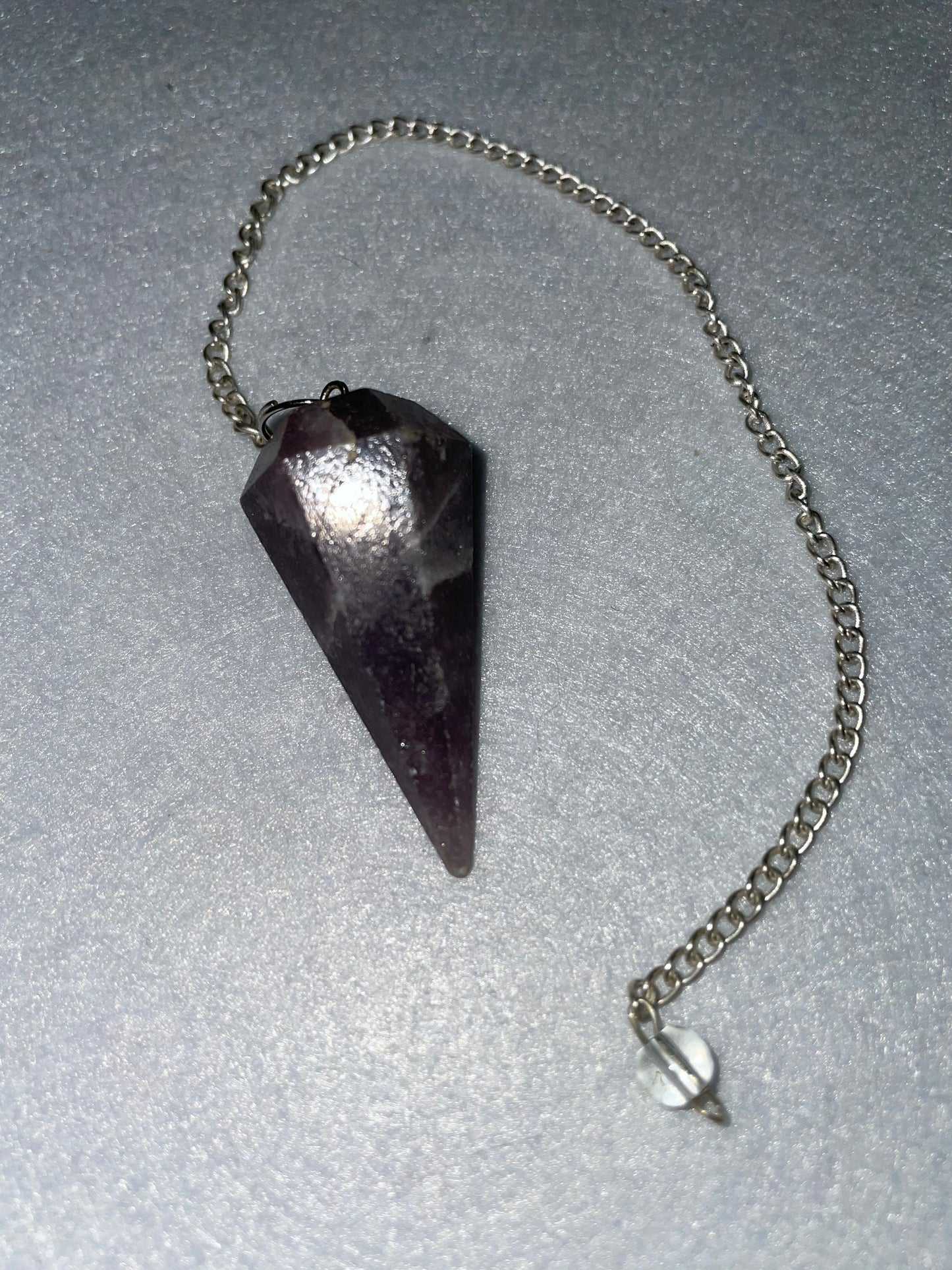Lovely healing Amethyst Pendulum is 1.65” and with chain is 9.5”.