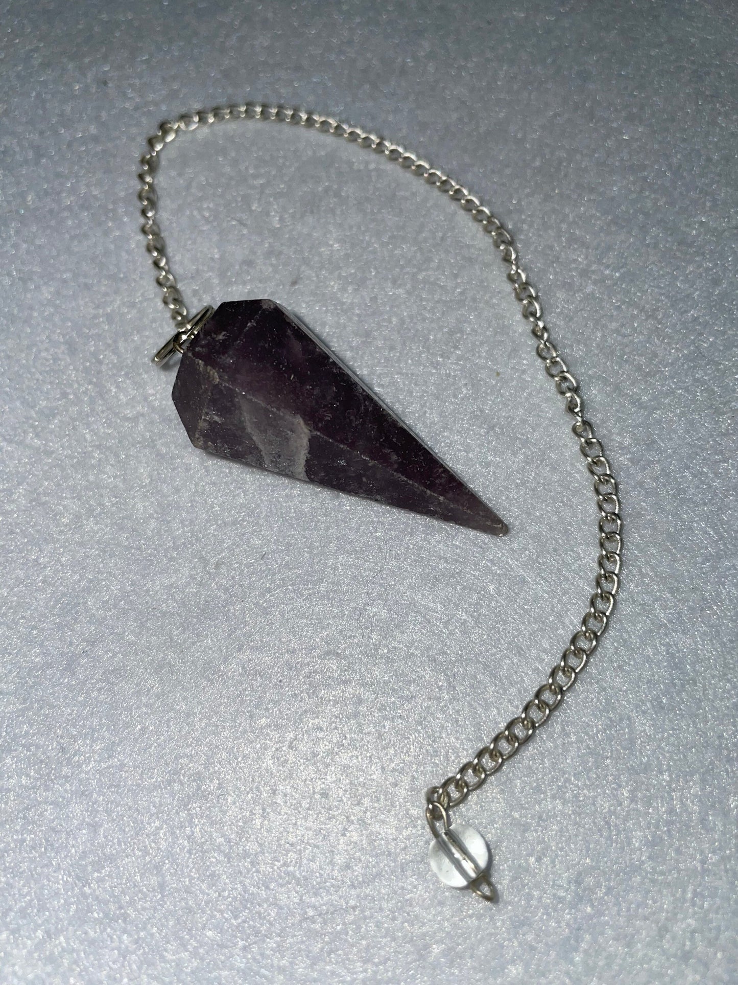 Lovely healing Amethyst Pendulum is 1.65” and with chain is 9.5”.