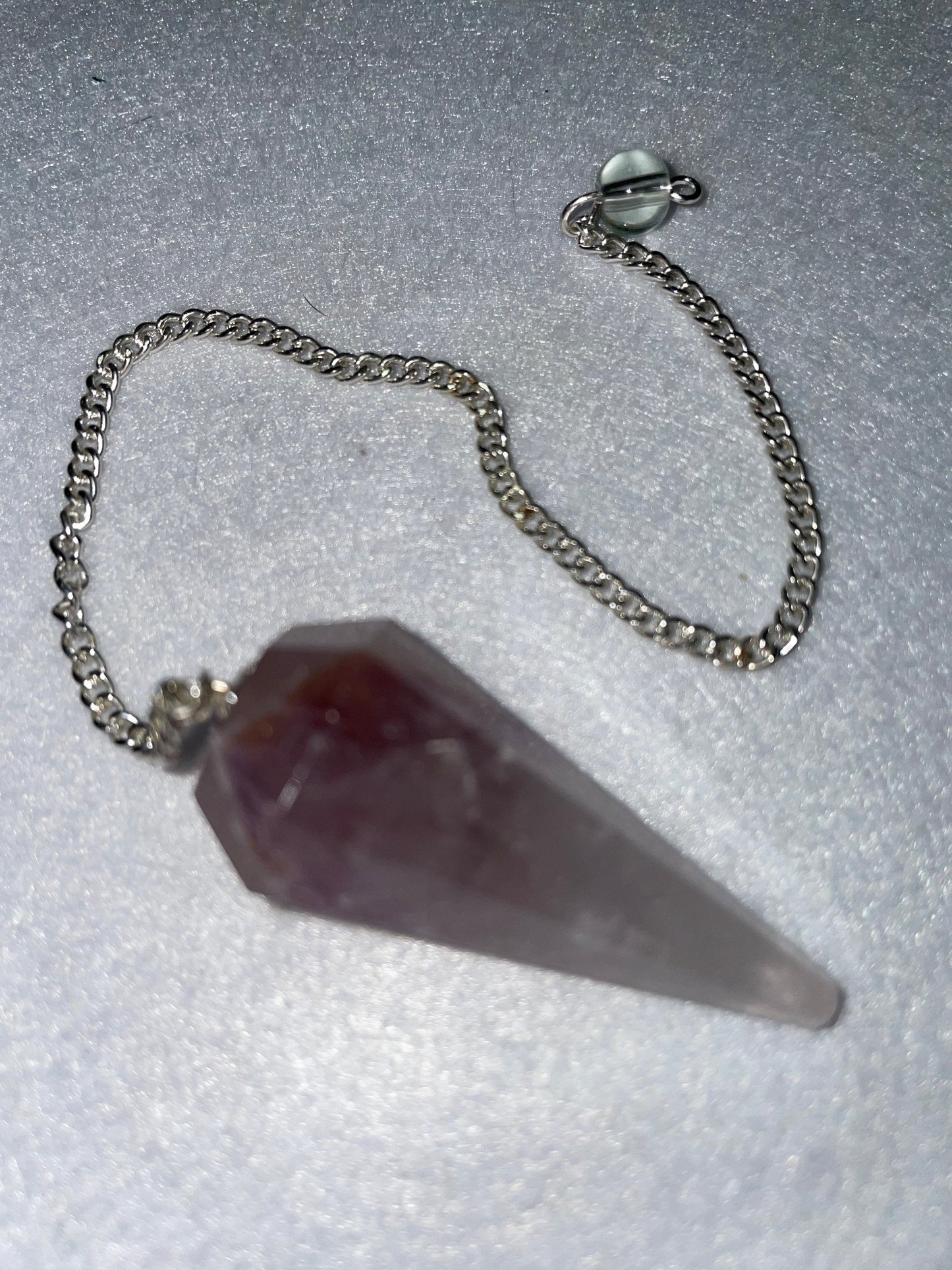 Amethyst Pendulum is 1.75” and with chain is 8.75”