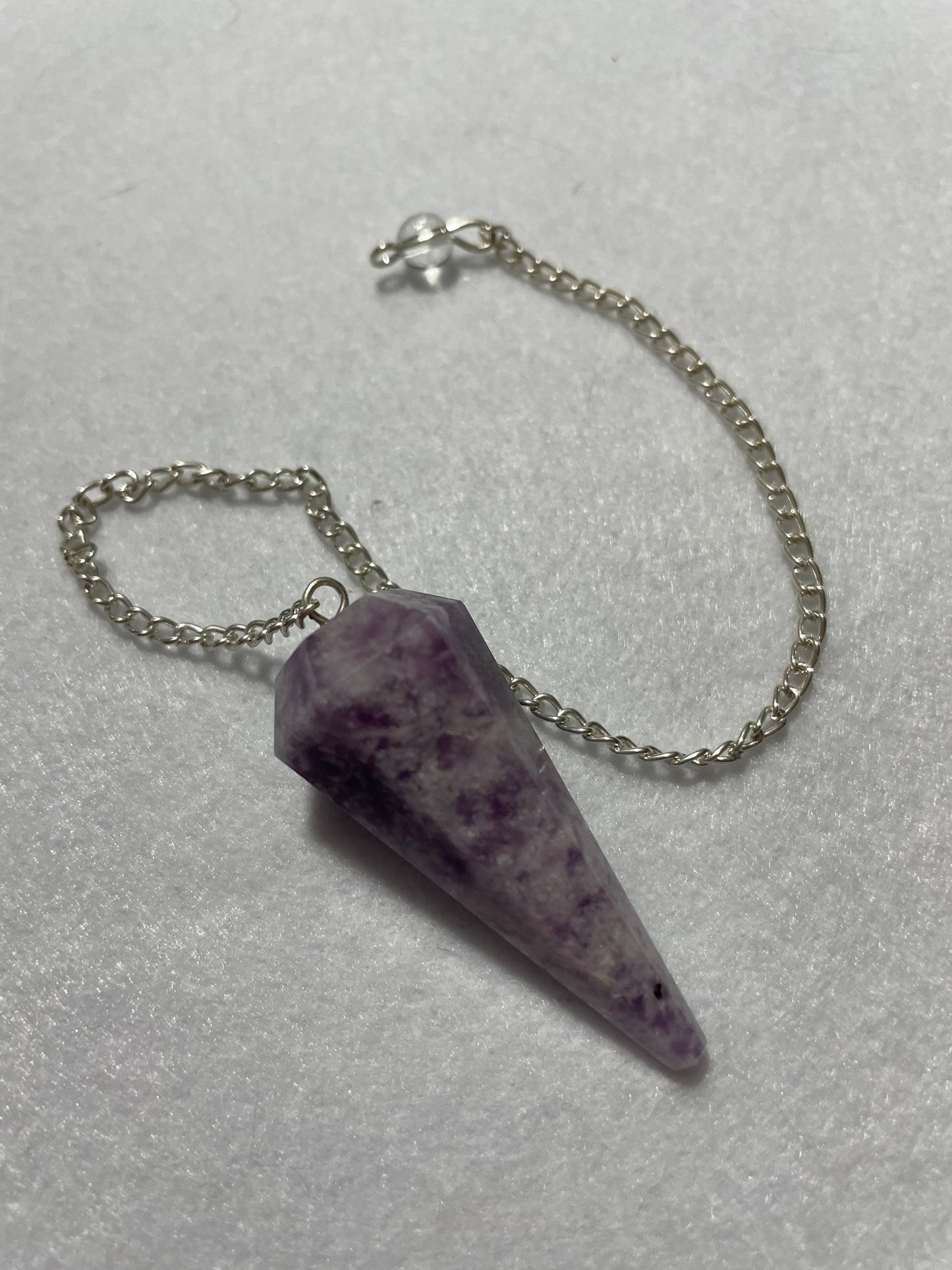 Pretty purple Lepidolite Pendulum is 1.65” and with chain is 9”
