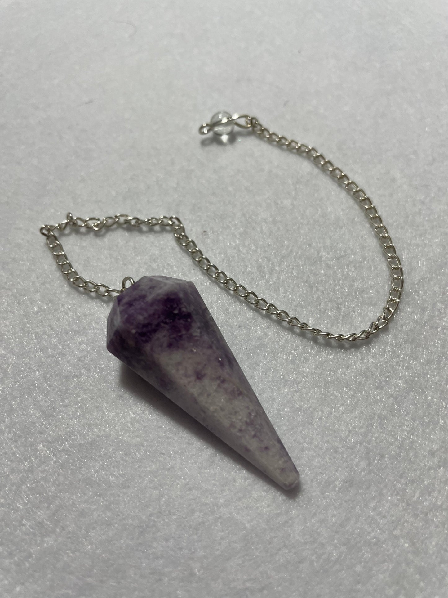 Pretty purple Lepidolite Pendulum is 1.65” and with chain is 9”
