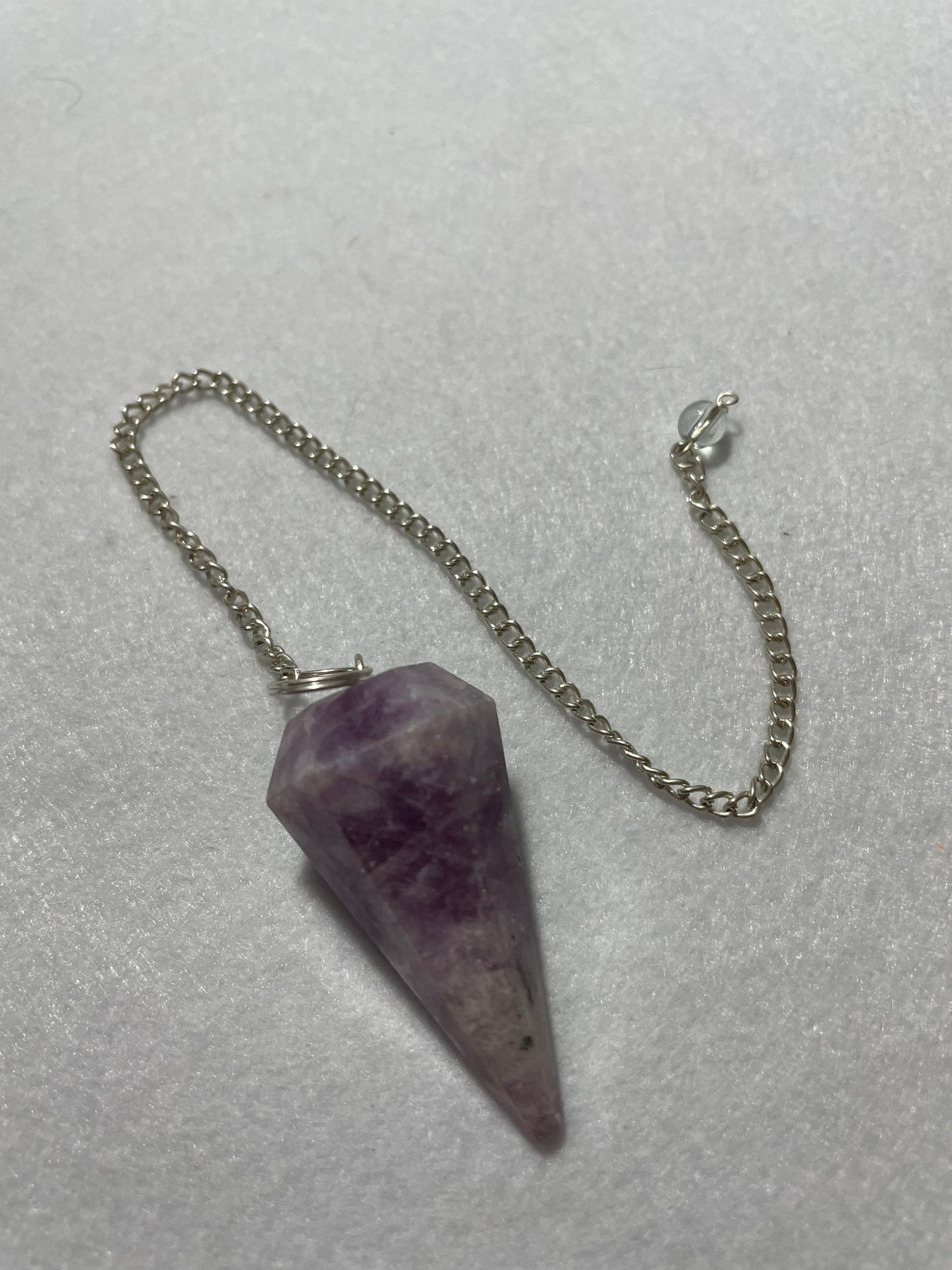 Gorgeous Lepidolite Pendulum is 1.75” and with chain is 9.25”