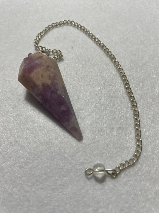 This magnificent pink and purple Lepidolite Pendulum is  1.75” and with chain is 9”.