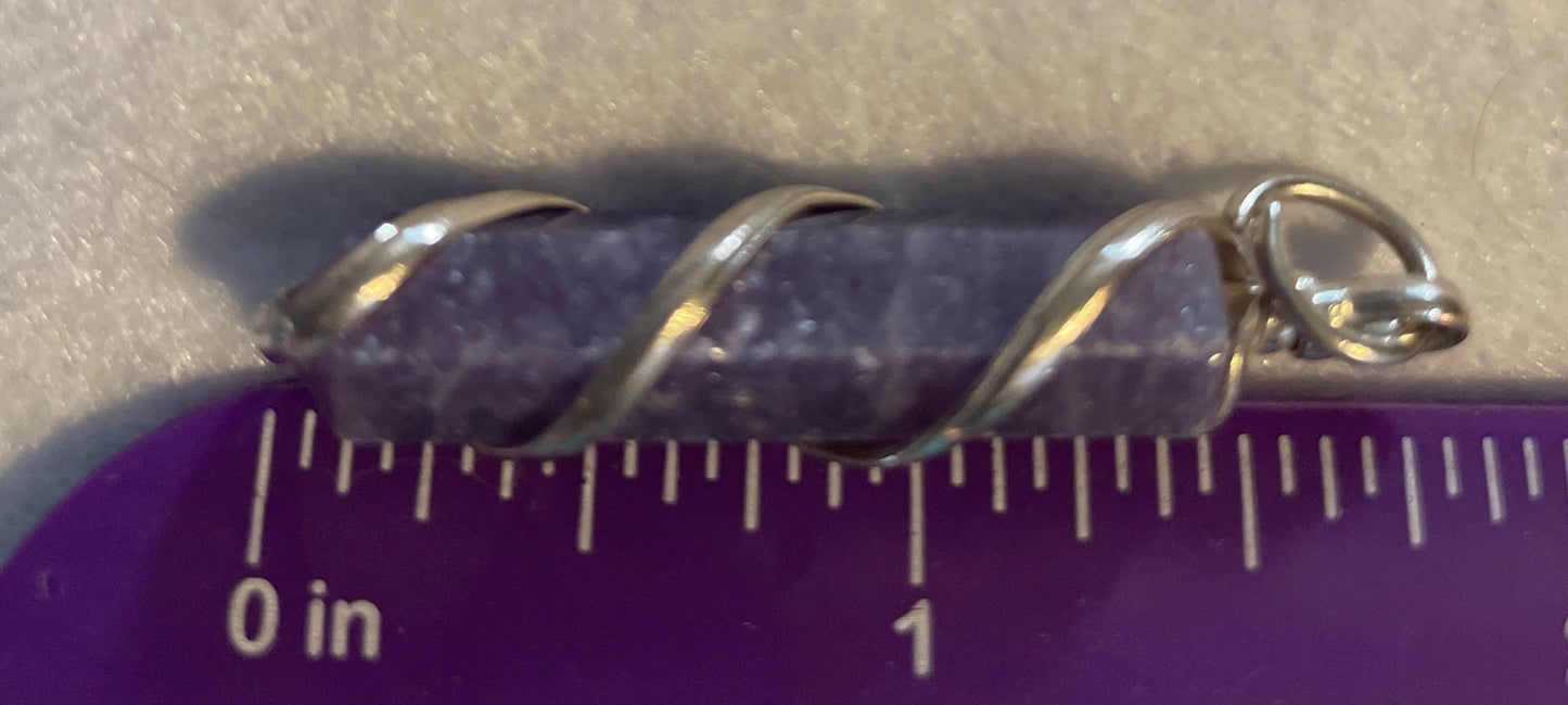 Gorgeous Amethyst Point Pendant is 1.50” and is wrapped in precious silver