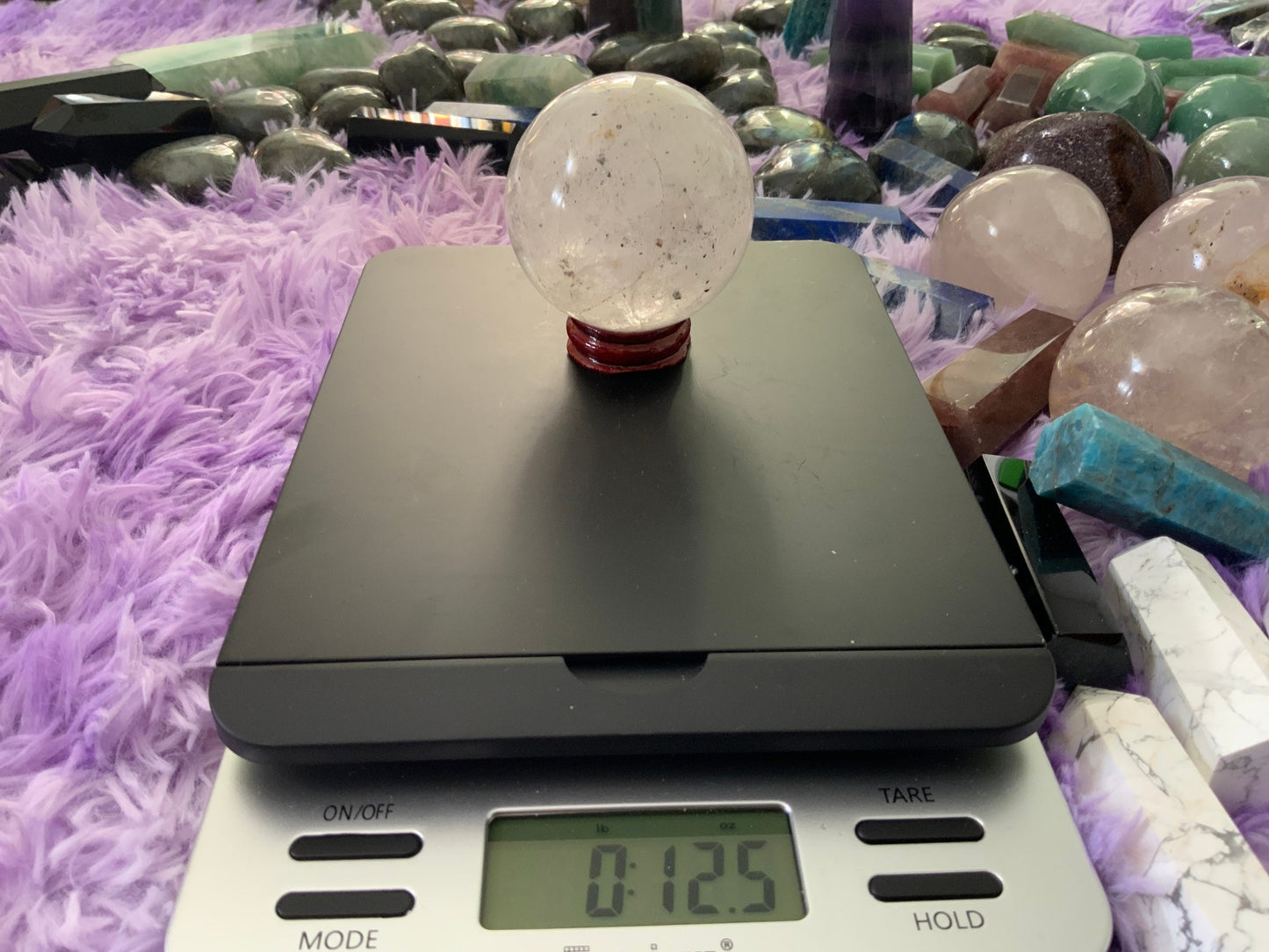 Beautiful 12.5 ounce clear quartz sphere crystal ball with wooden stand