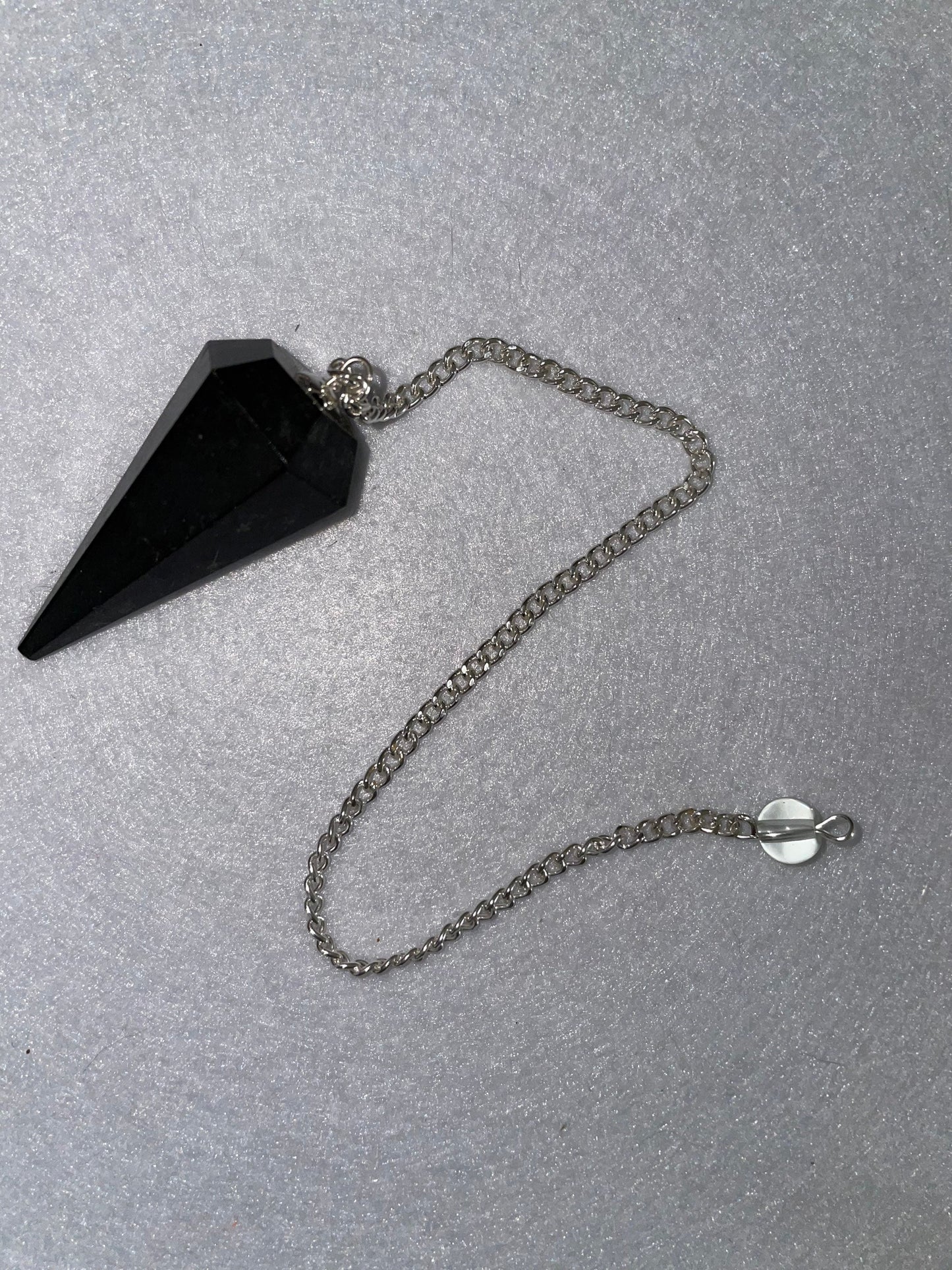 Black Obsidian Pendulum is 1.65” and with chain is 8.5”