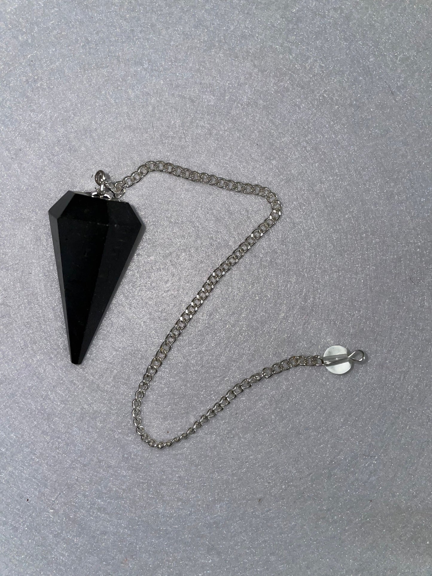 Black Obsidian Pendulum is 1.65” and with chain is 8.5”