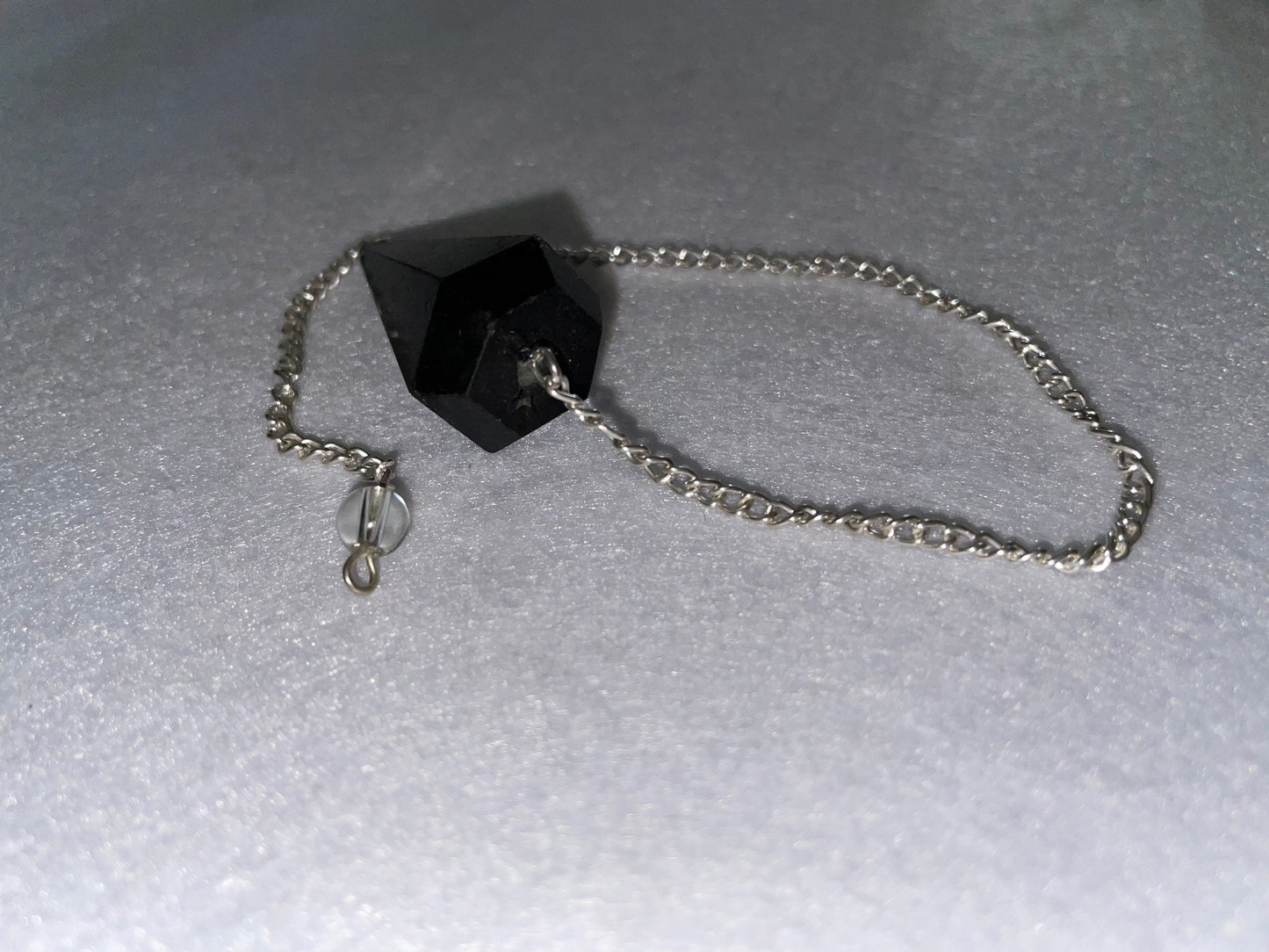 Awesome Black Obsidian Pendulum is 1.5” and with chain is 9”.25”