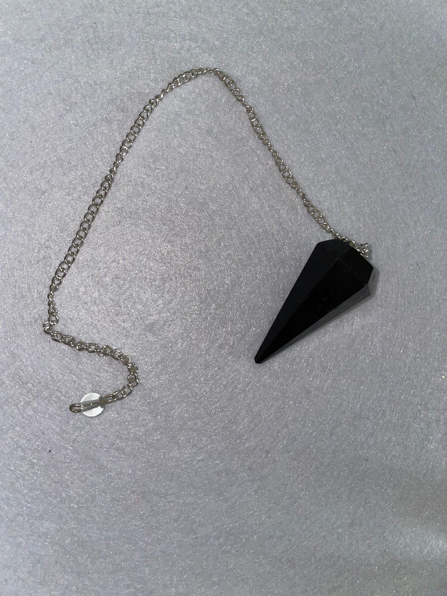 Awesome Black Obsidian Pendulum is 1.5” and with chain is 9”.25”
