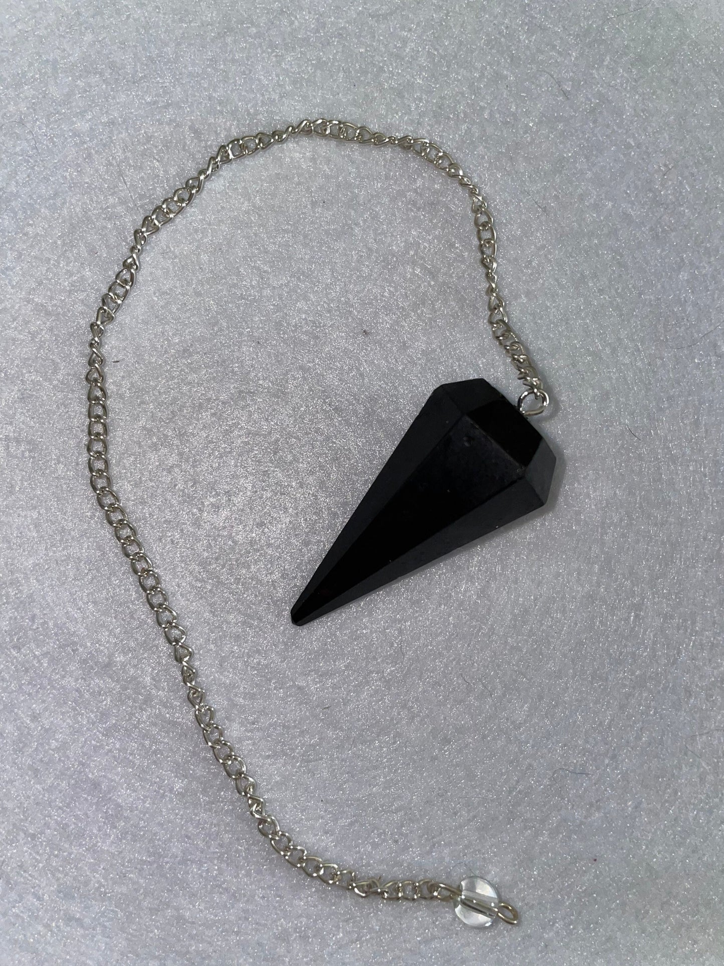 Awesome Black Obsidian Pendulum is 1.5” and with chain is 9”.25”