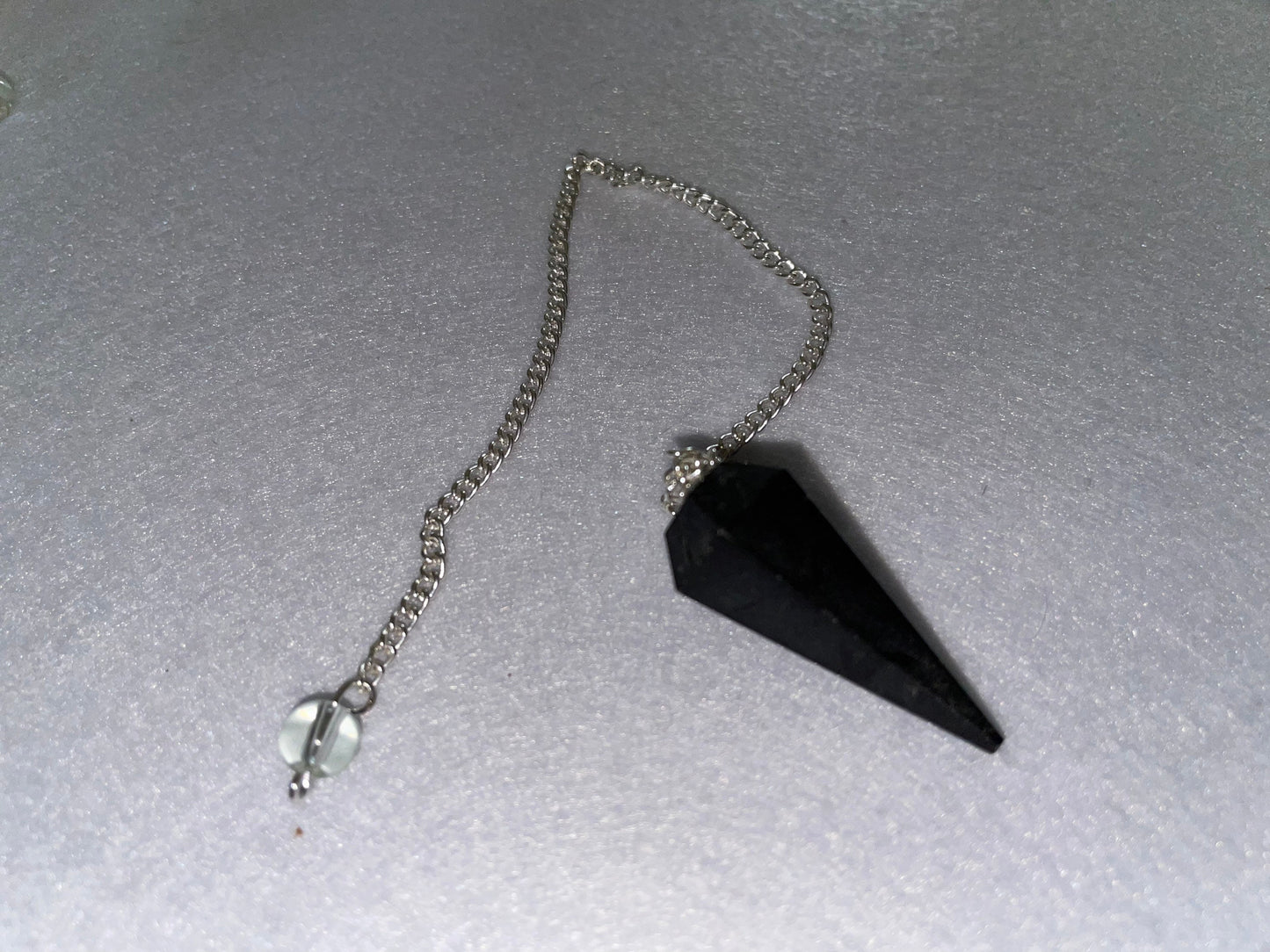 Pretty Black Obsidian Pendulum is 1.5” and with chain is 9”