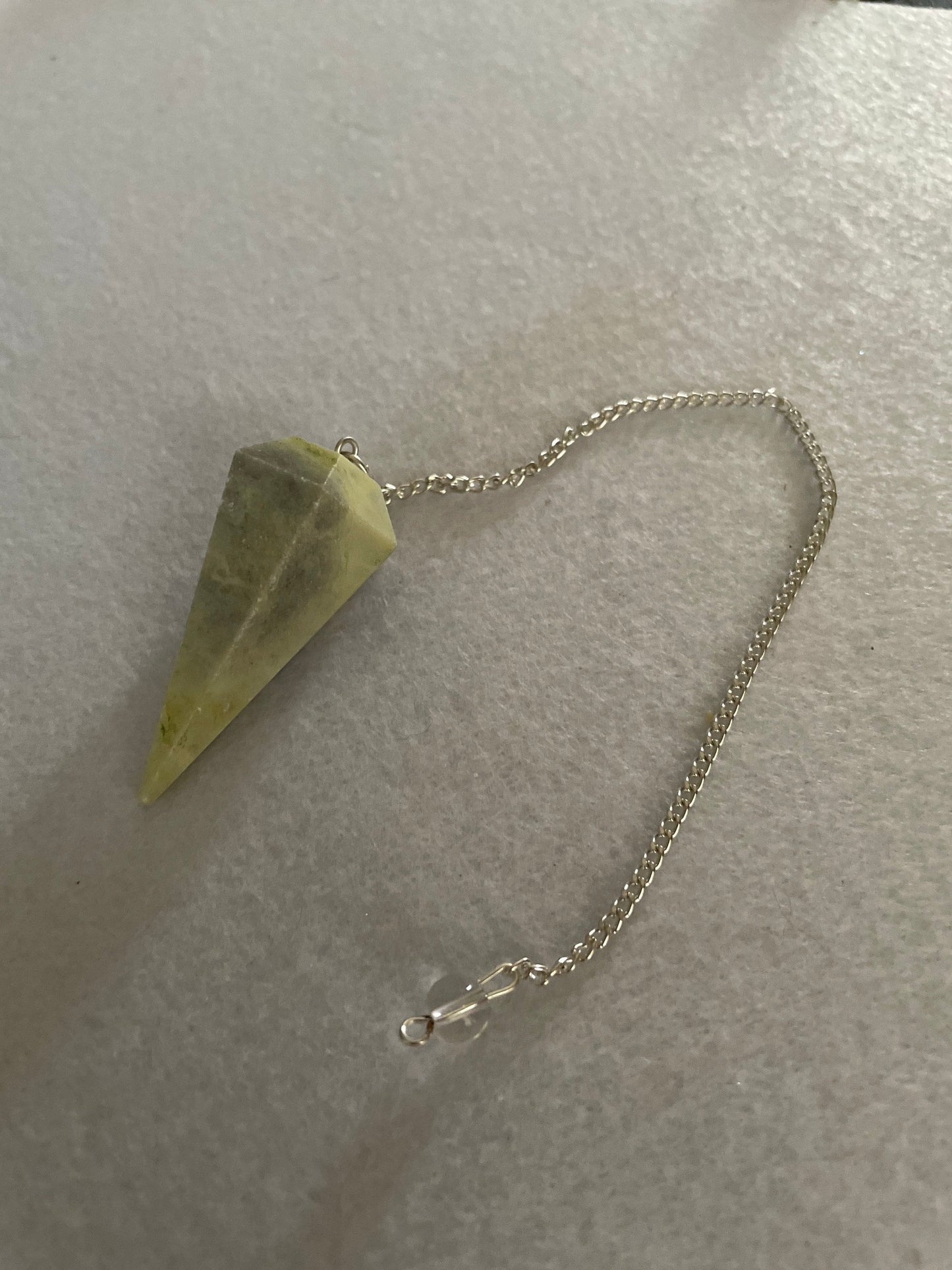 Beautiful Serpentine Pendulum is 1.85” and with chain is 8.5”