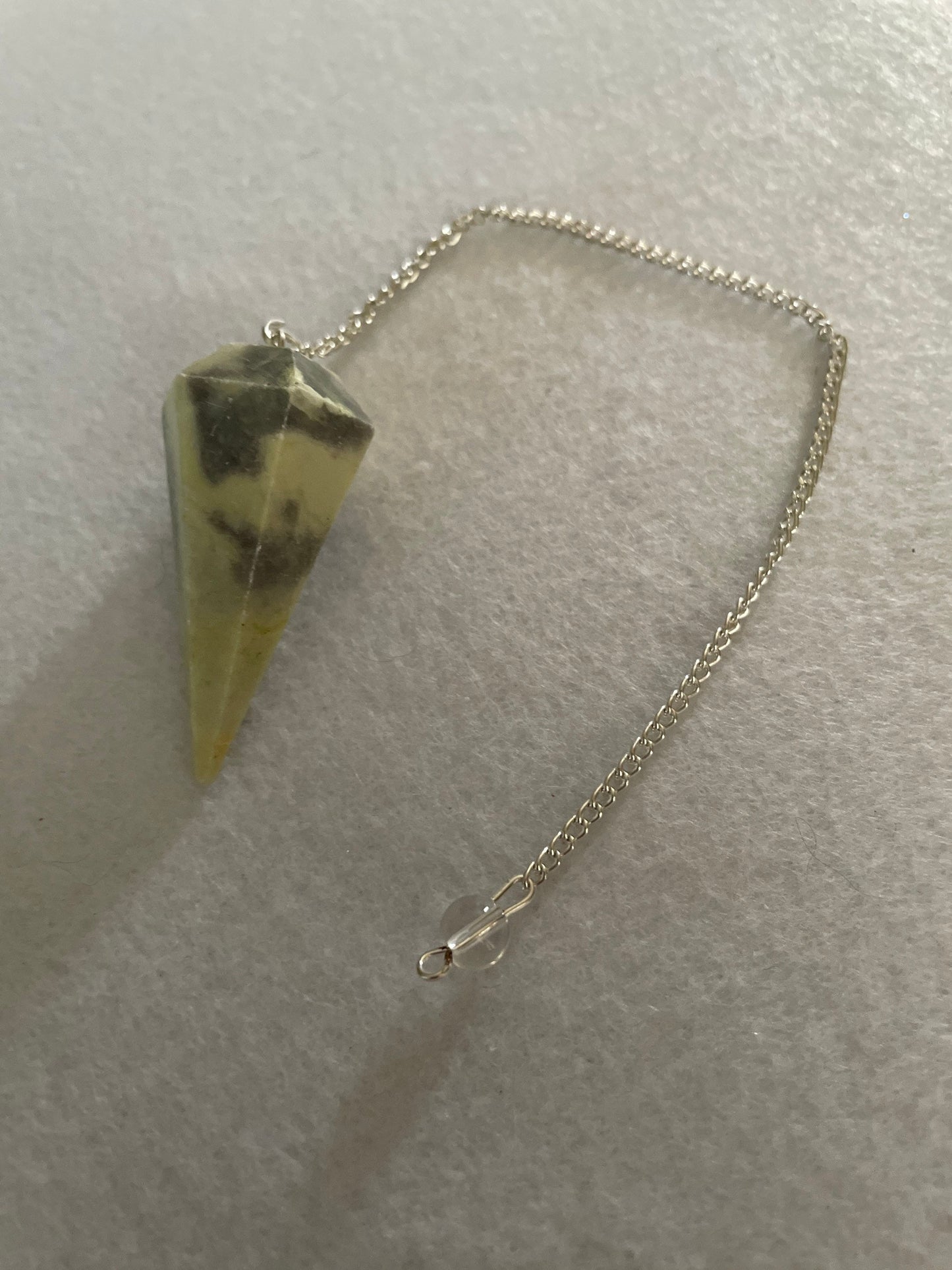 Beautiful Serpentine Pendulum is 1.85” and with chain is 8.5”