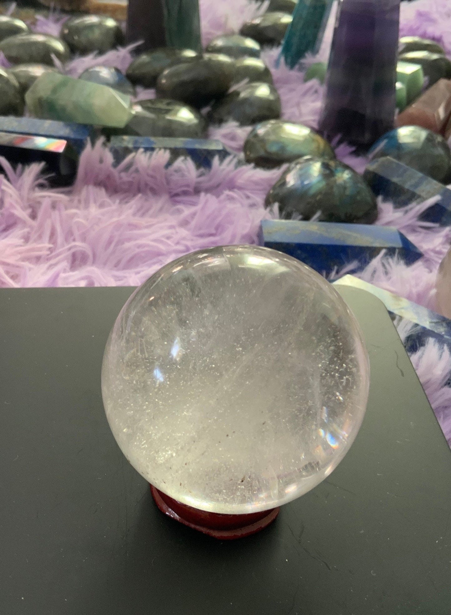 Beautiful 10.3 oz crystal clear quartz sphere crystal ball with wooden stand