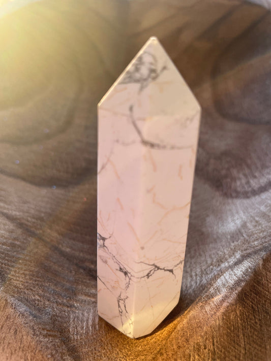 Awesome Howlite point crystal with beautiful cuts