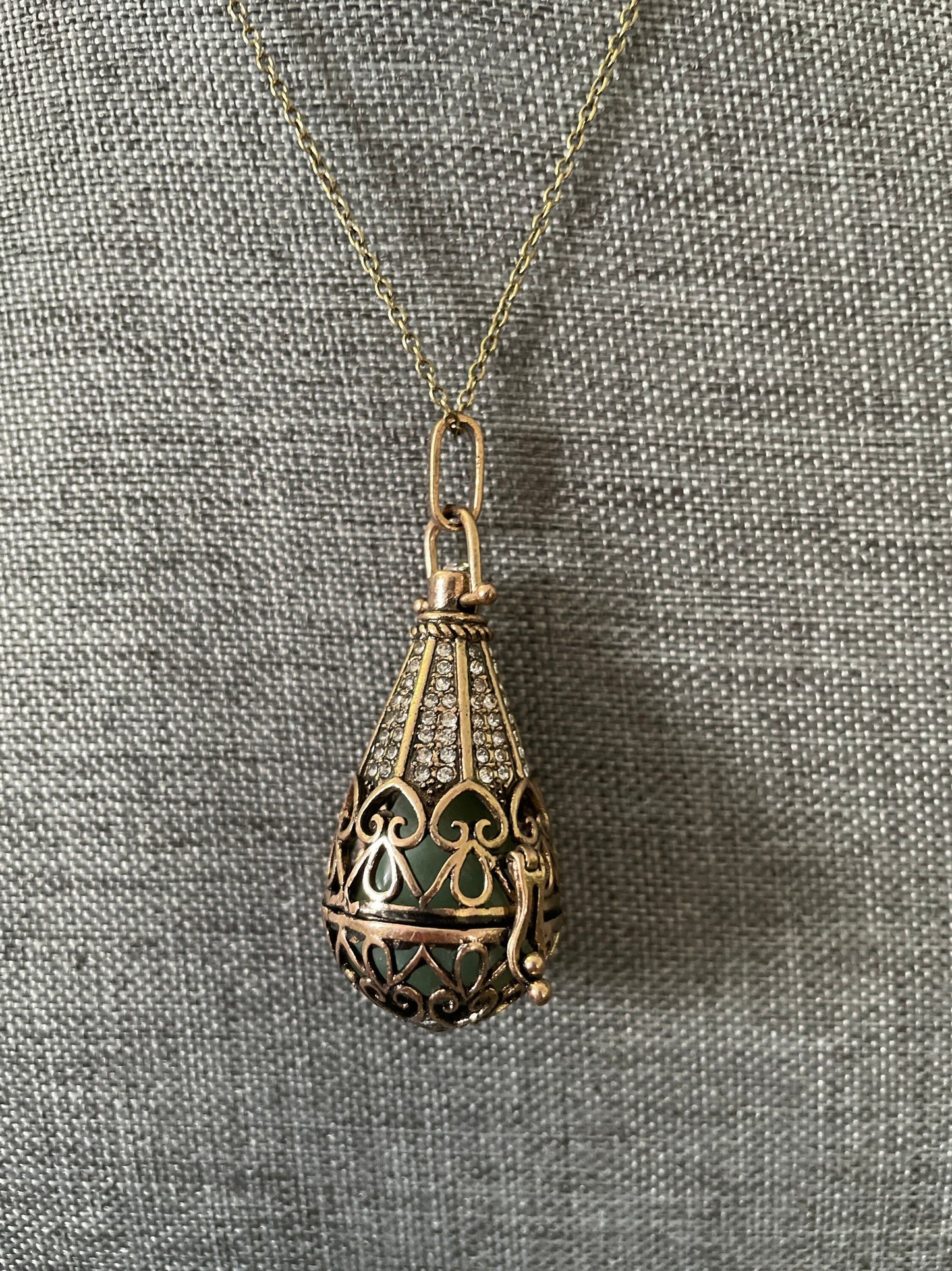 Antique Gold locket with 6 interchangeable crystals on 16” antique gold chain