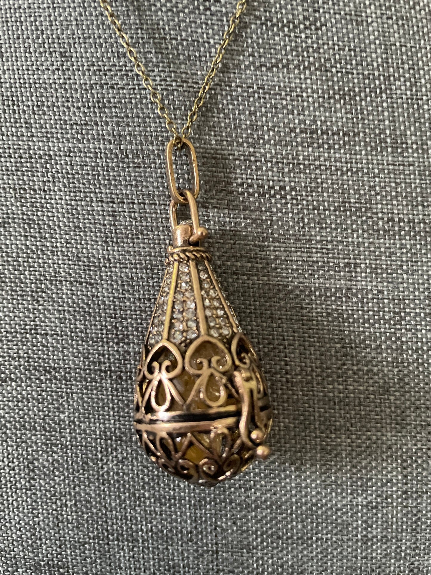 Antique Gold locket with 6 interchangeable crystals on 16” antique gold chain
