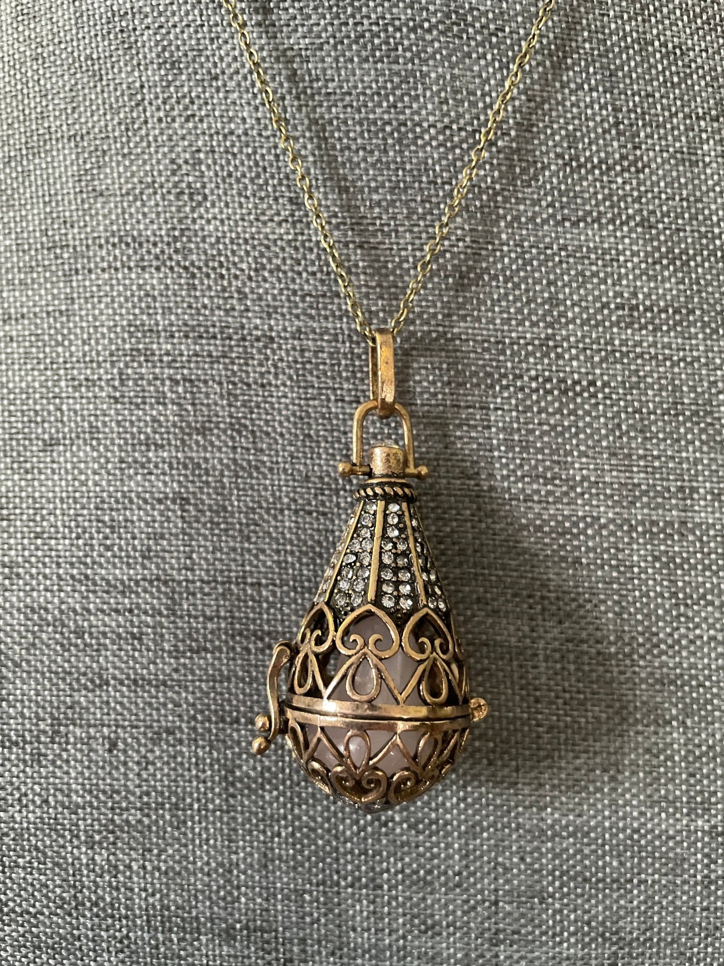 Antique Gold locket with 6 interchangeable crystals on 16” antique gold chain