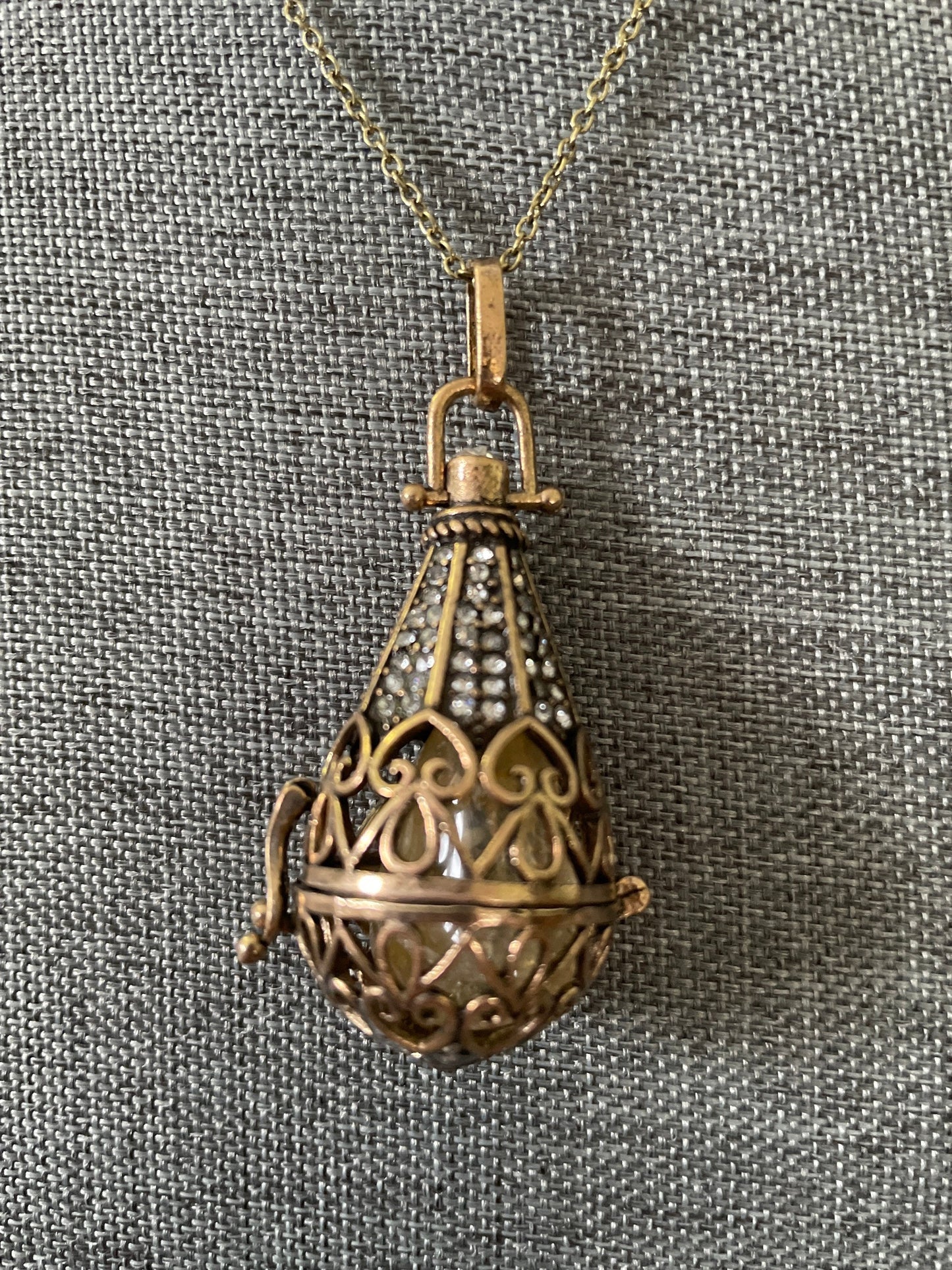 Antique Gold locket with 6 interchangeable crystals on 16” antique gold chain