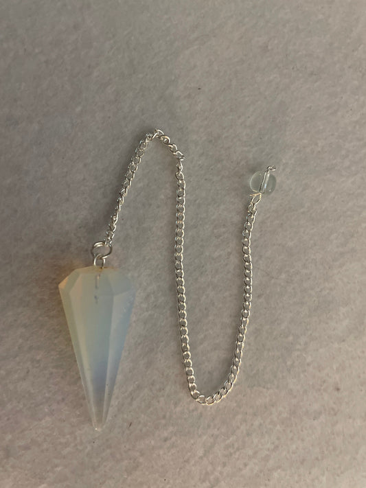 This beautiful  Opalite pendulum is approximately 1.65” and with chain is 8.5”