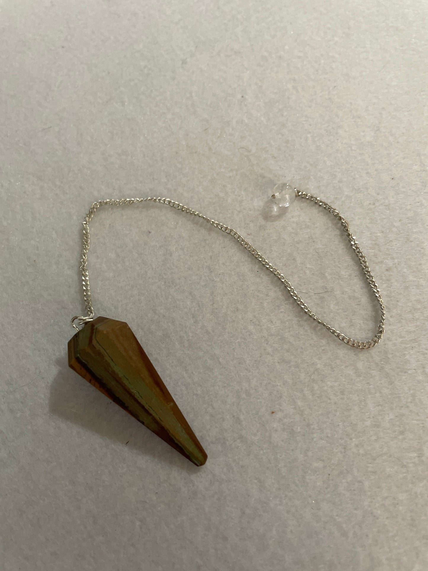 Beautiful Tiger’s Eye pendulum ornaments perfect for dowsing. Hang it in a well lit window, from the ceiling or on the wall!