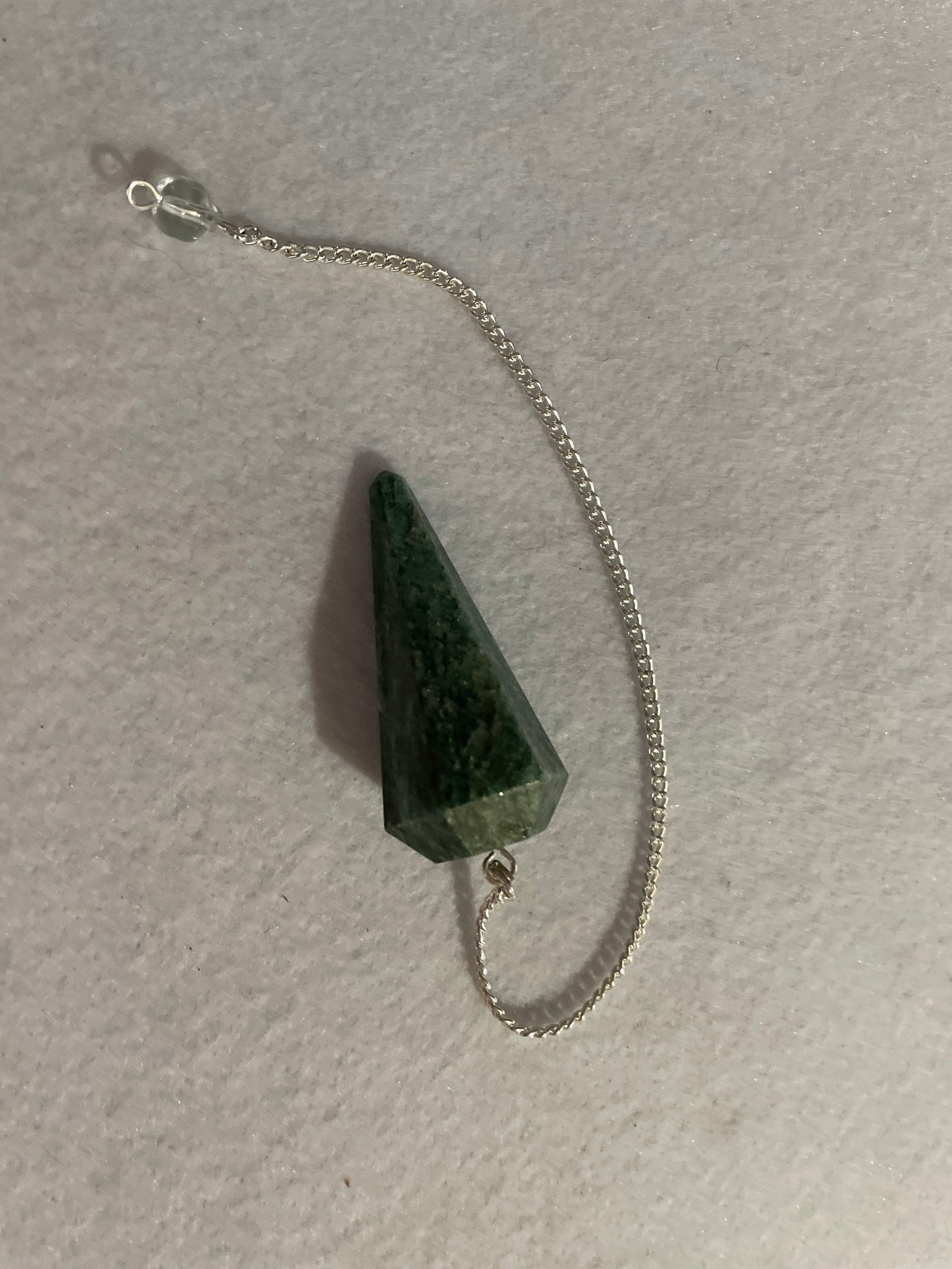 Pretty Jade Pendulum is 1.75” and with chain is 8.5”