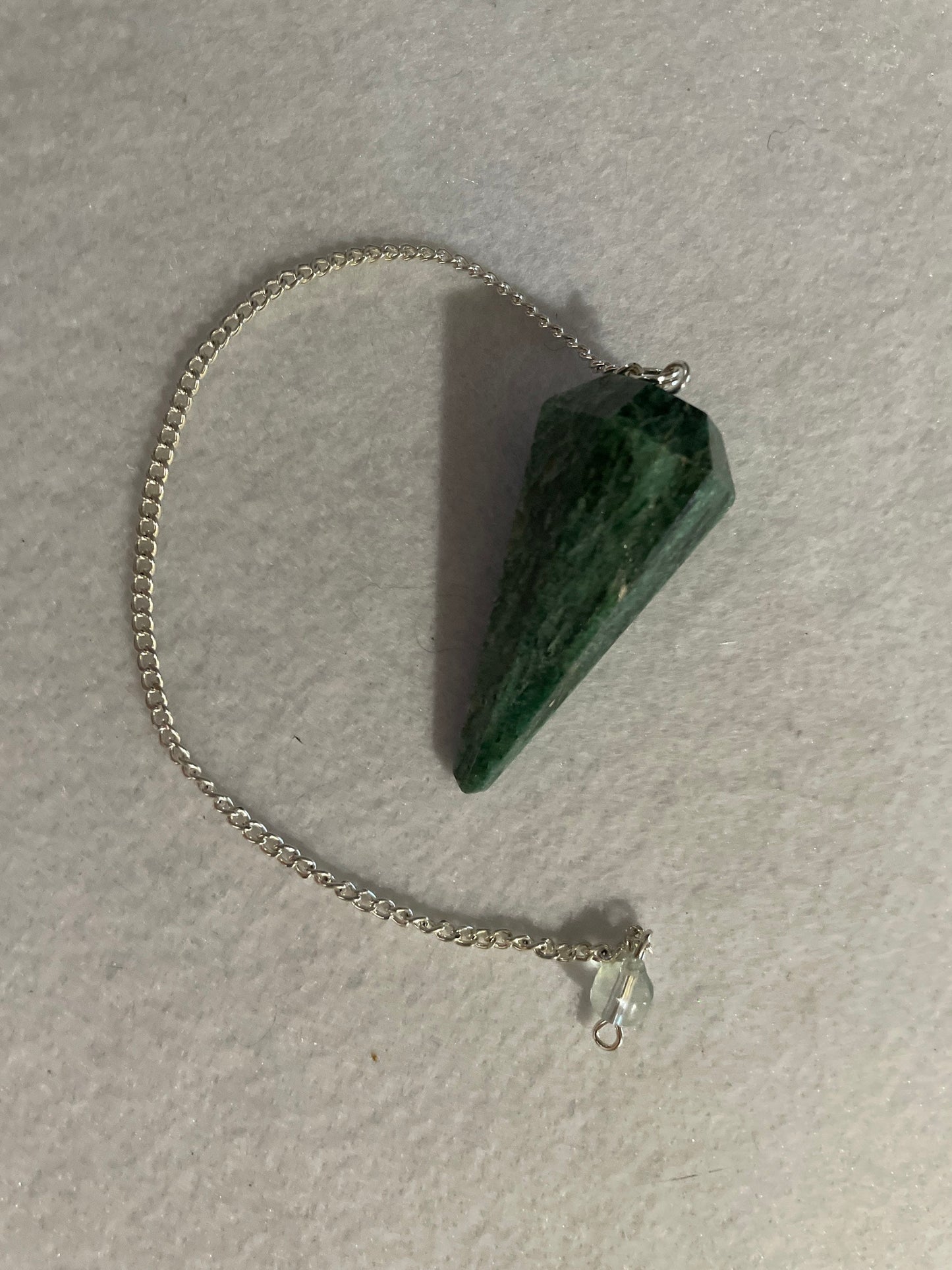 Pretty Jade Pendulum is 1.75” and with chain is 8.5”