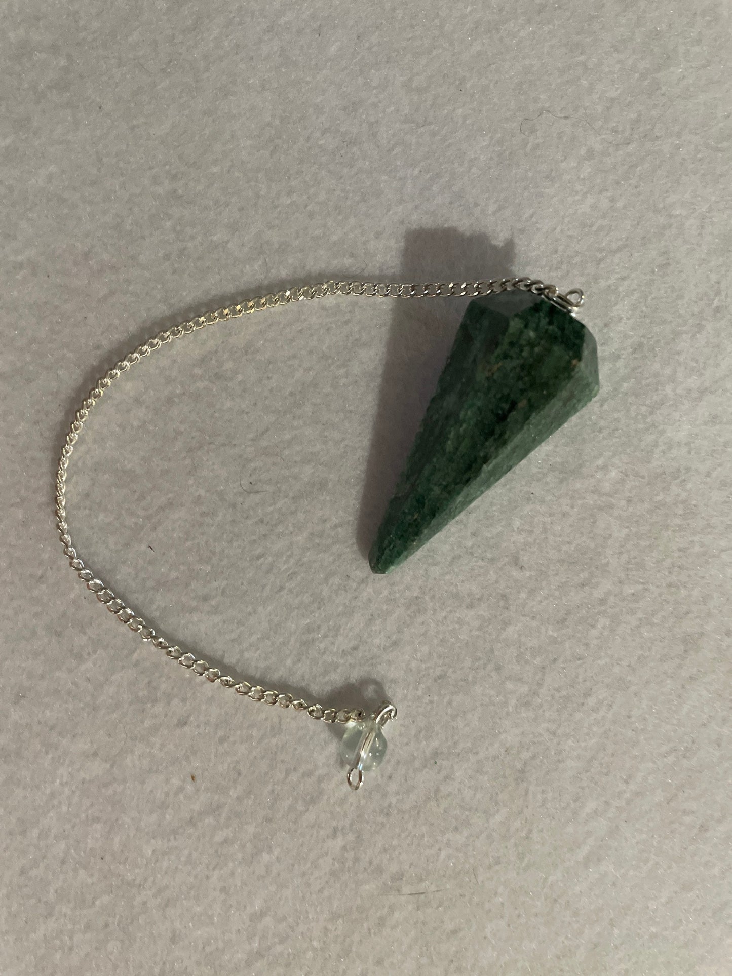 Pretty Jade Pendulum is 1.75” and with chain is 8.5”