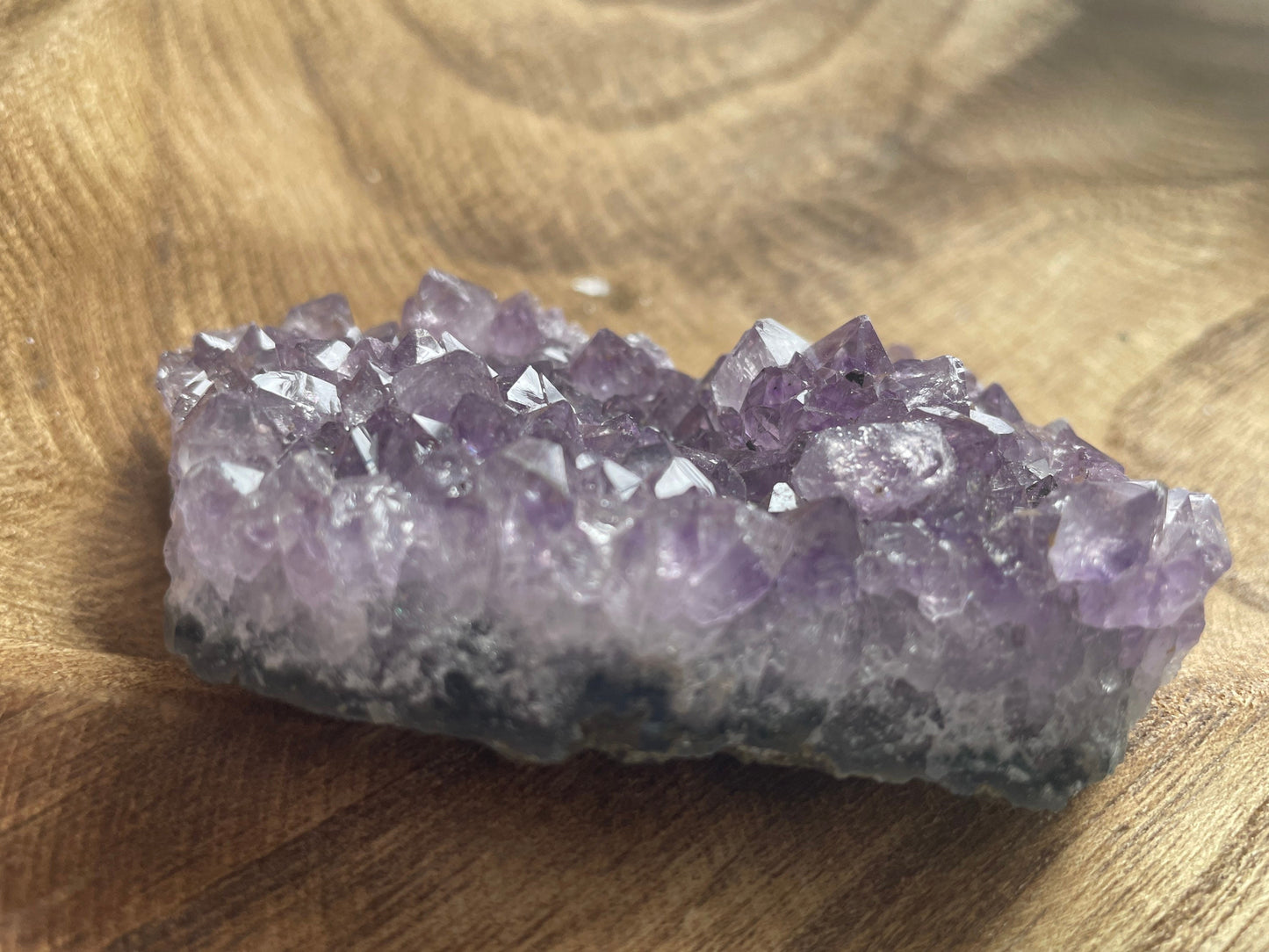Uruguay amethyst cluster with a bit of Quartz is a perfect gift for any Aquarius or February birthday.