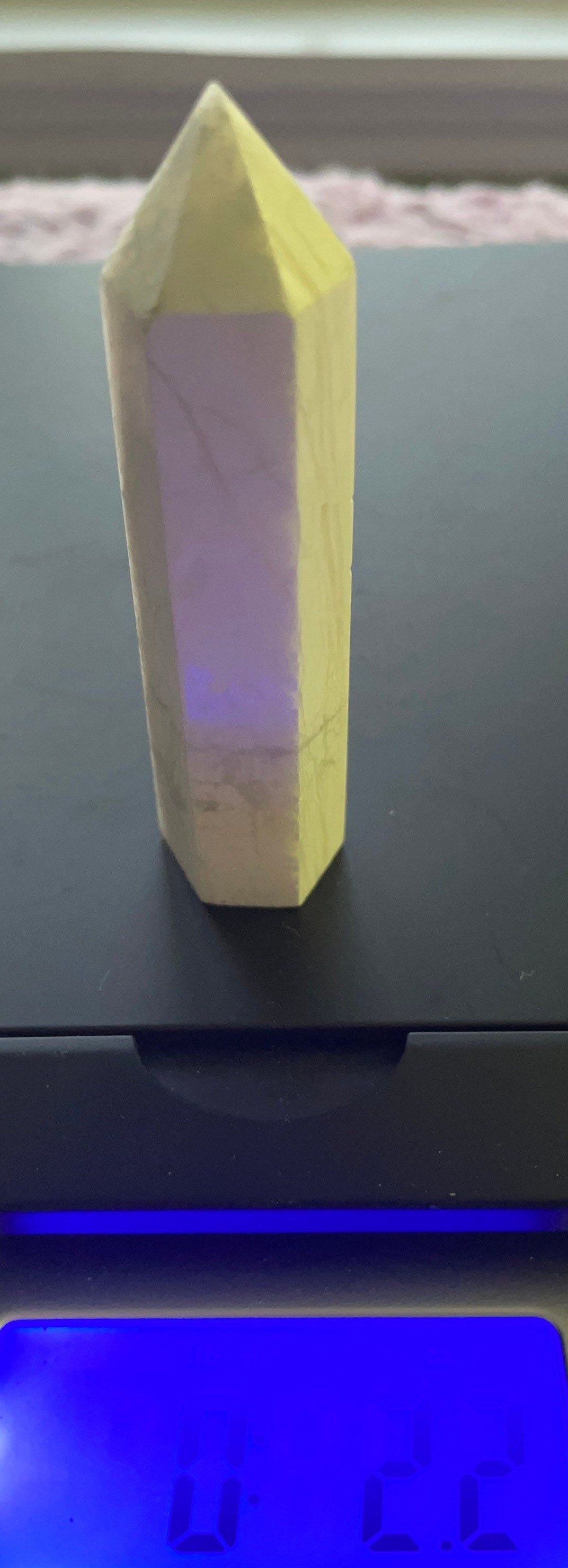 Gorgeous Howlite point crystal with beautiful cuts 3.13 inches