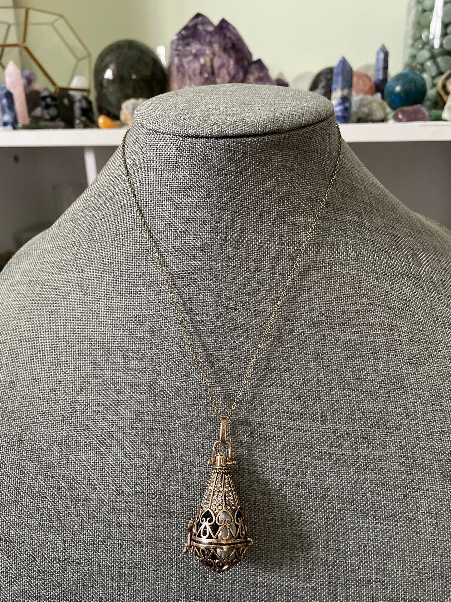Antique Gold locket with 6 interchangeable crystals on 16” antique gold chain