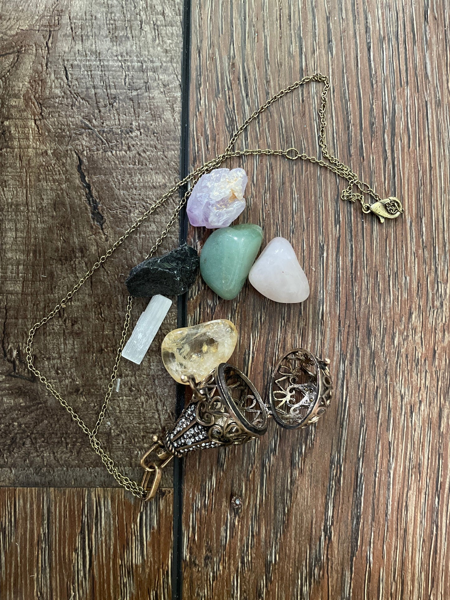 Antique Gold locket with 6 interchangeable crystals on 16” antique gold chain