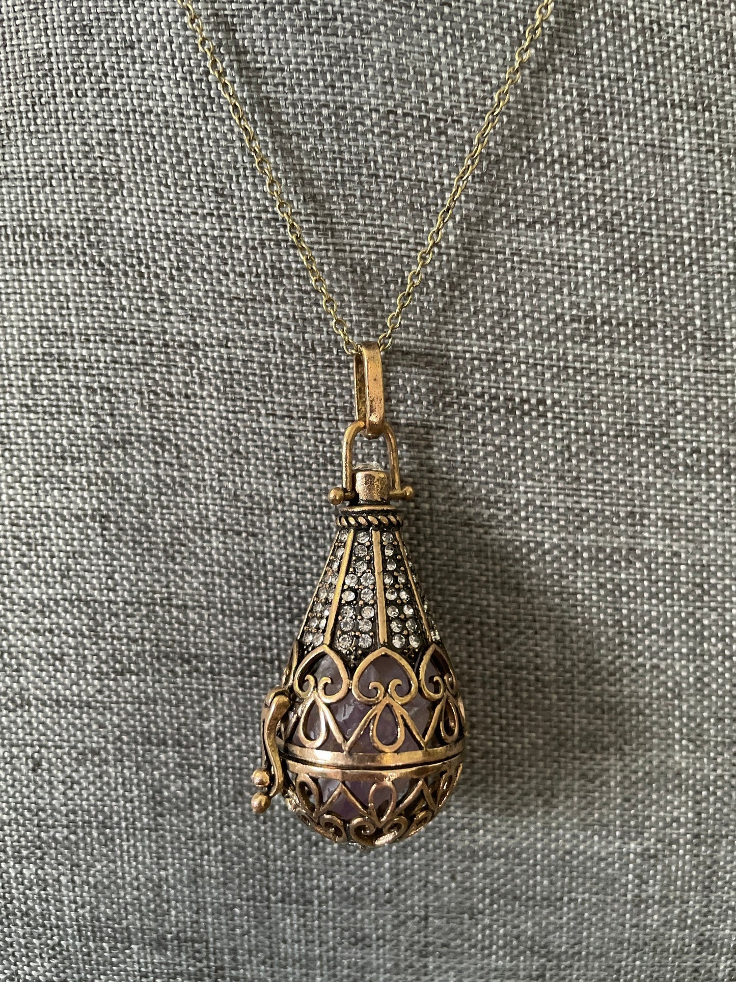 Antique Gold locket with 6 interchangeable crystals on 16” antique gold chain