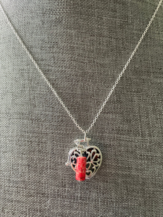 Silver stainless steel locket filled with crystals on 16+” silver stainless steel chain