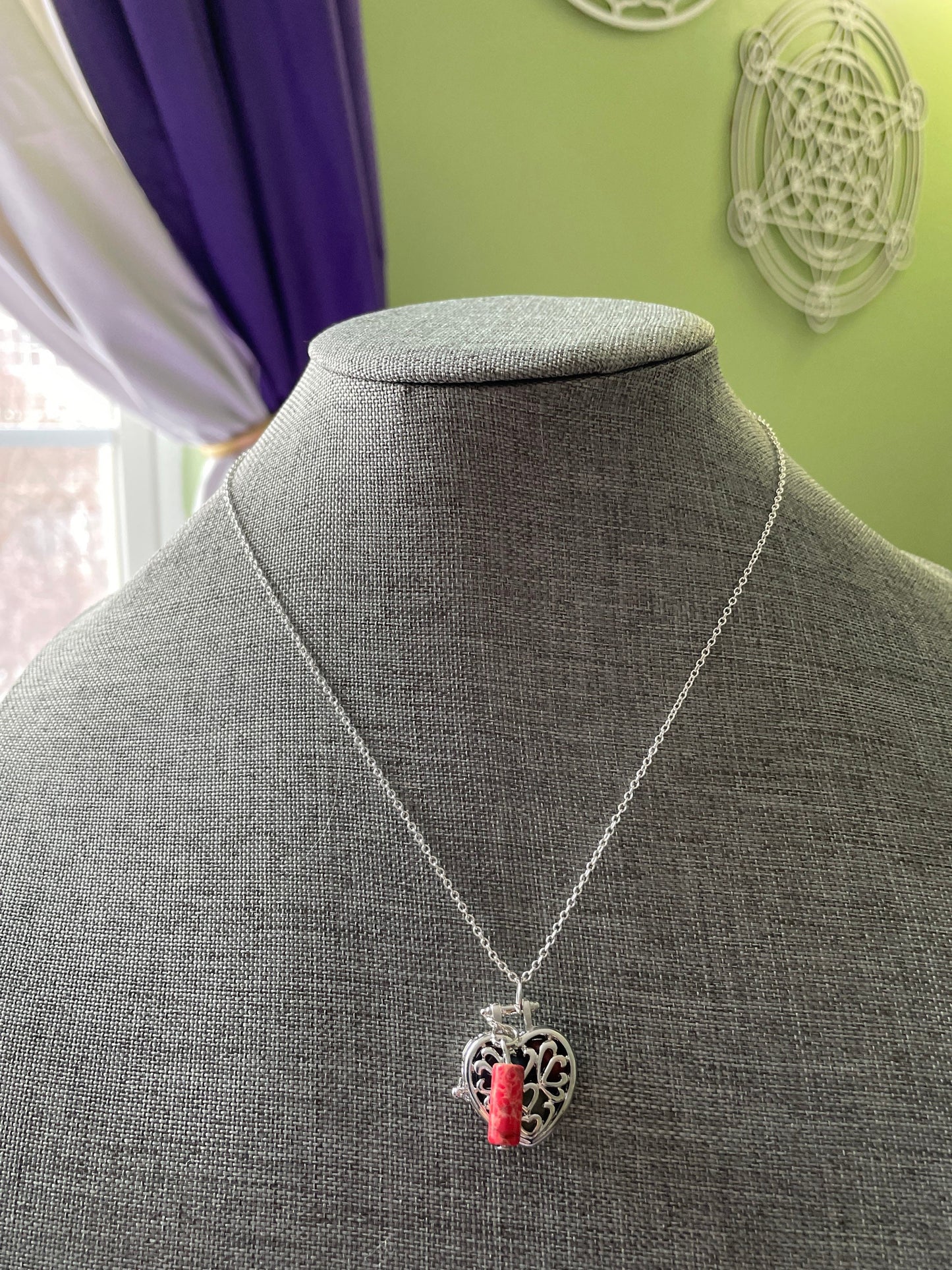 Silver stainless steel locket filled with crystals on 16+” silver stainless steel chain