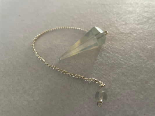 Pretty Opalite pendulum is approximately 1.5” and with chain is 8” total length