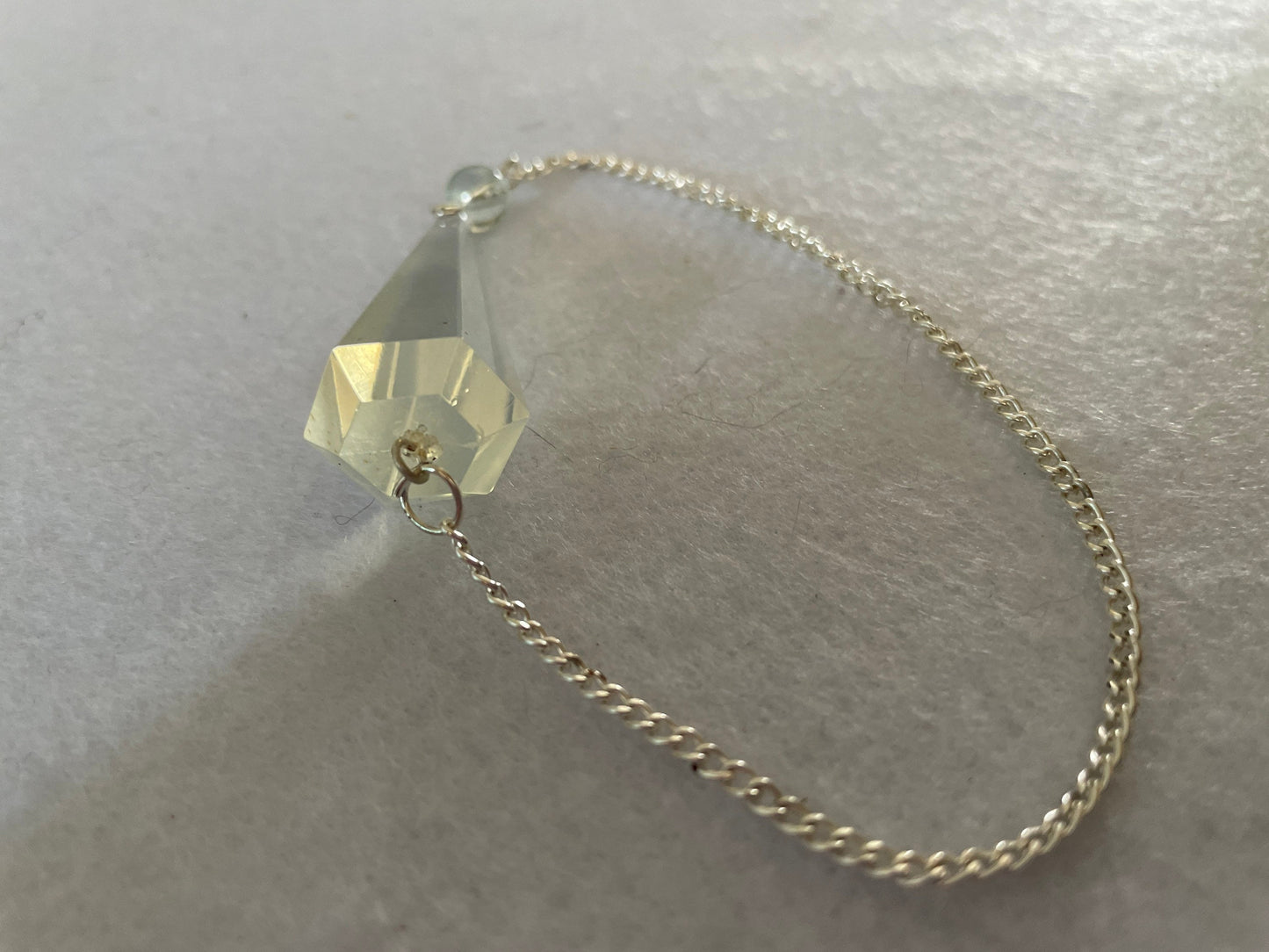 Beautiful Opalite pendulum is approximately 1.5” and with chain is 8.25” total length.