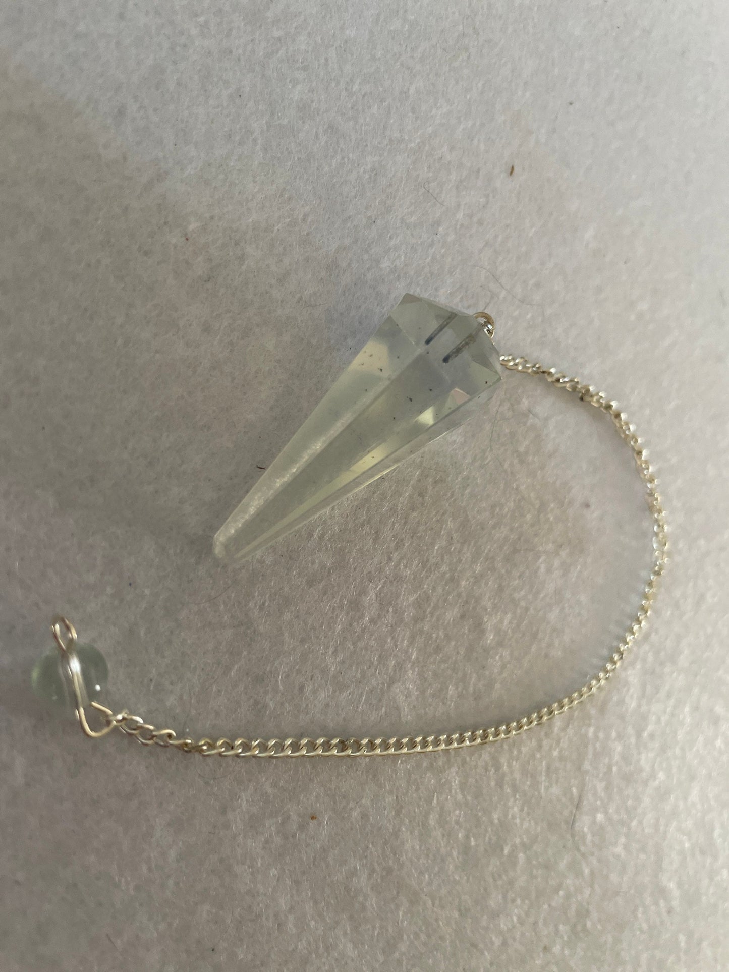 Beautiful Opalite pendulum is approximately 1.5” and with chain is 8.25” total length.