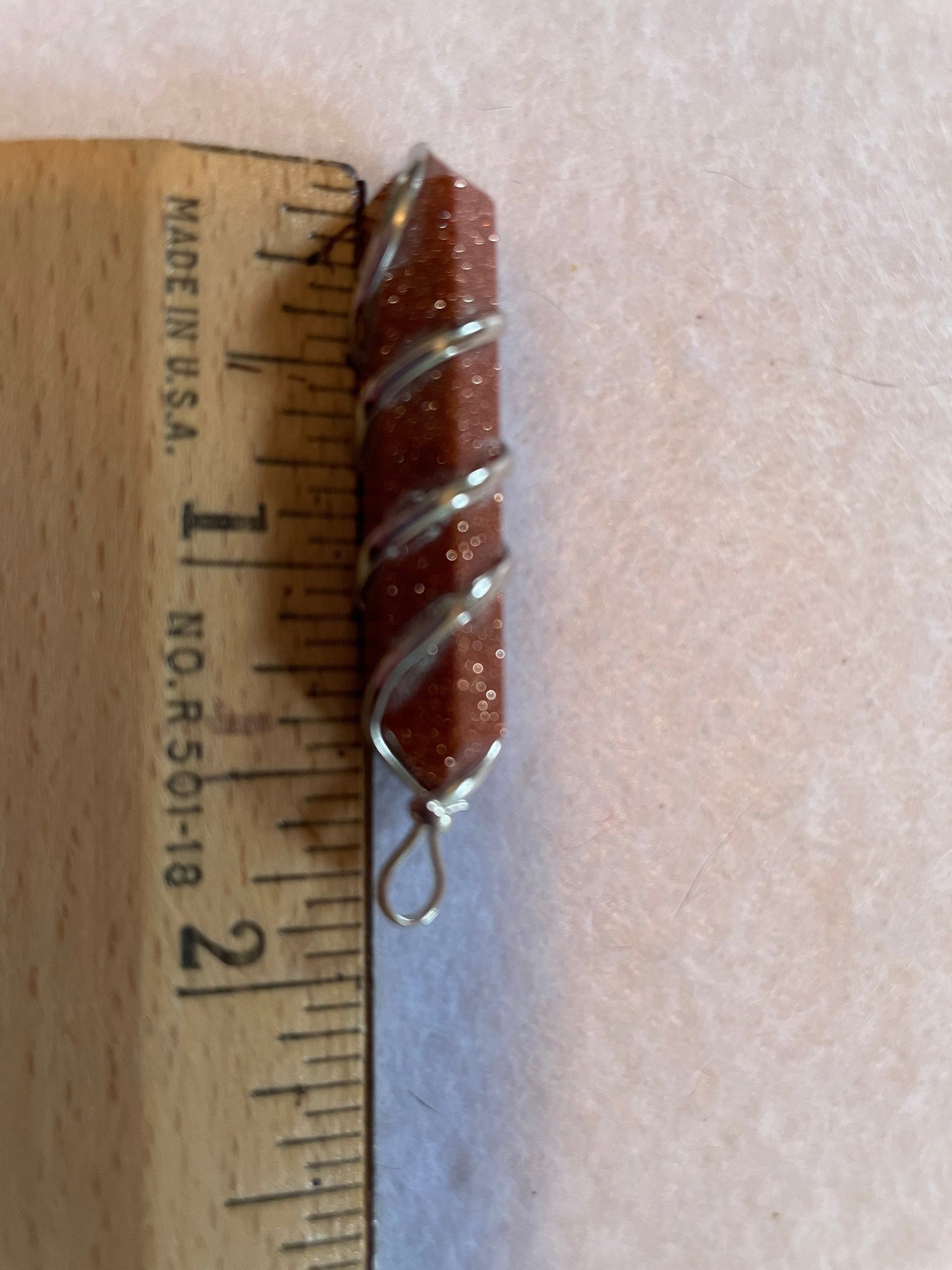 Gorgeous Goldstone Point Pendant is 1.5”